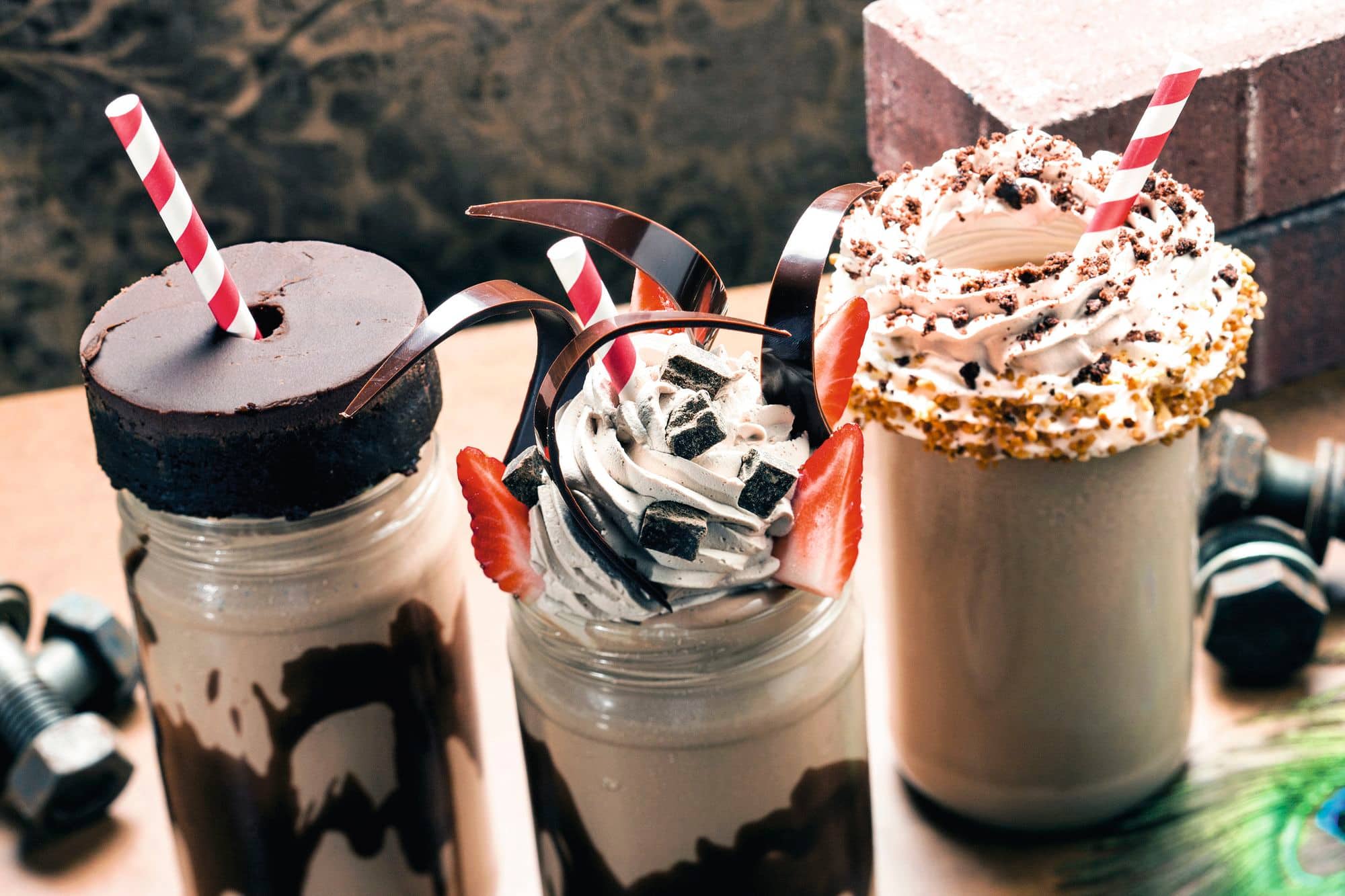 Big milkshakes with cream and chocolate.
