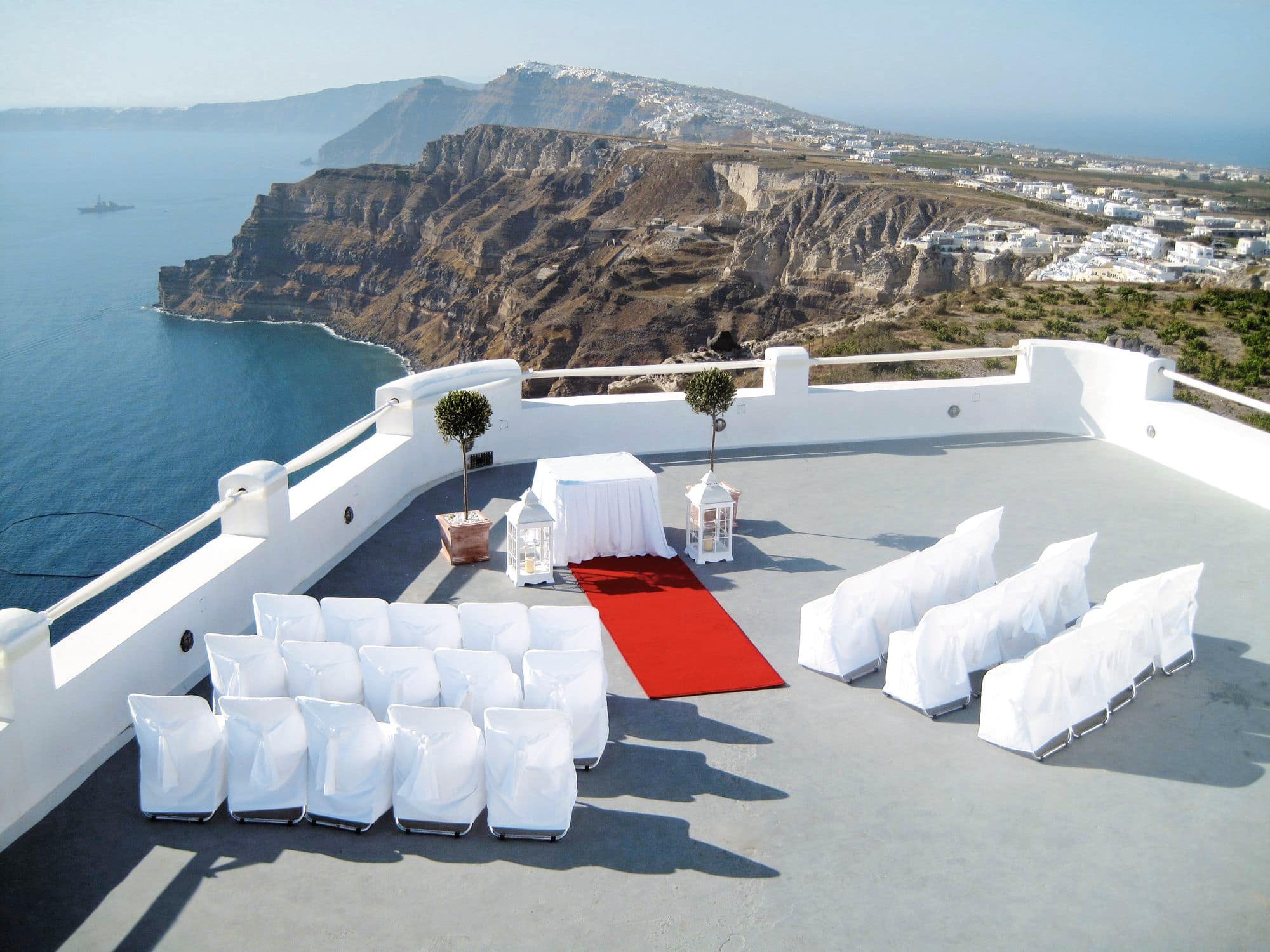 A wedding ceremony set-up in Santo Winery overlooking the coast of Santorini.