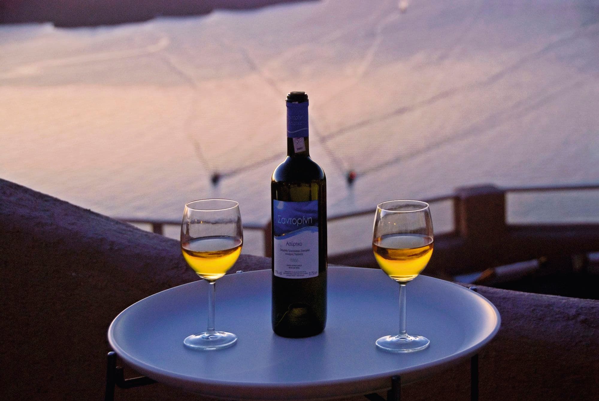 Bottle of wine with two glasses, Santorini