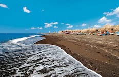 Relaxing on the beach, Perivolos, Santorini
