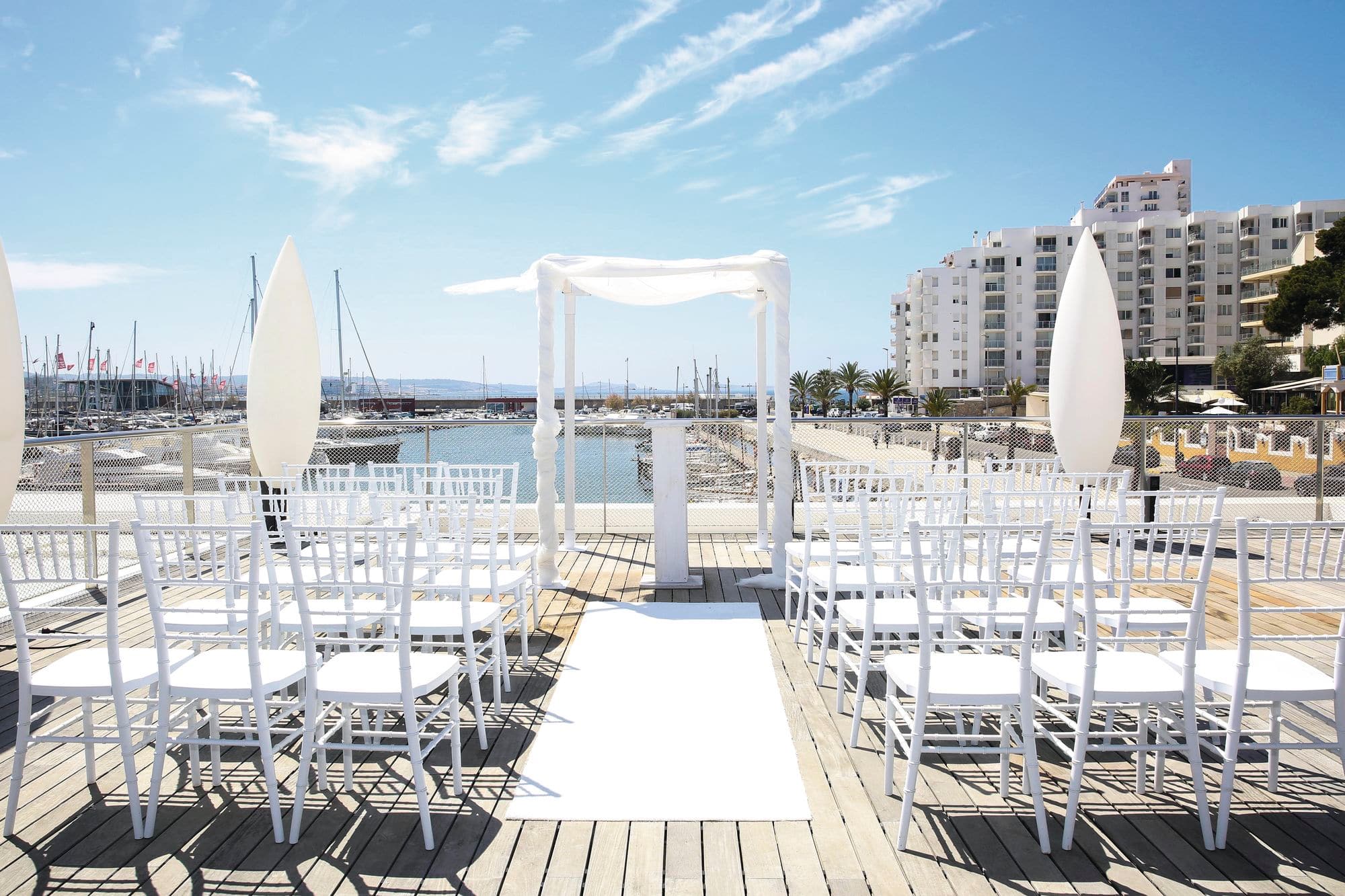 A wedding ceremony set-up at HarbourSide in San Antonio, Ibiza.