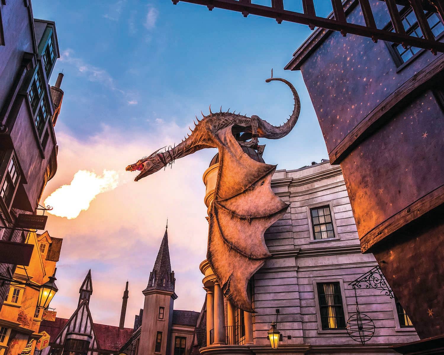 A fire breathing dragon sits on top of building within Diagon Alley in Universal Studios, Orlando.
