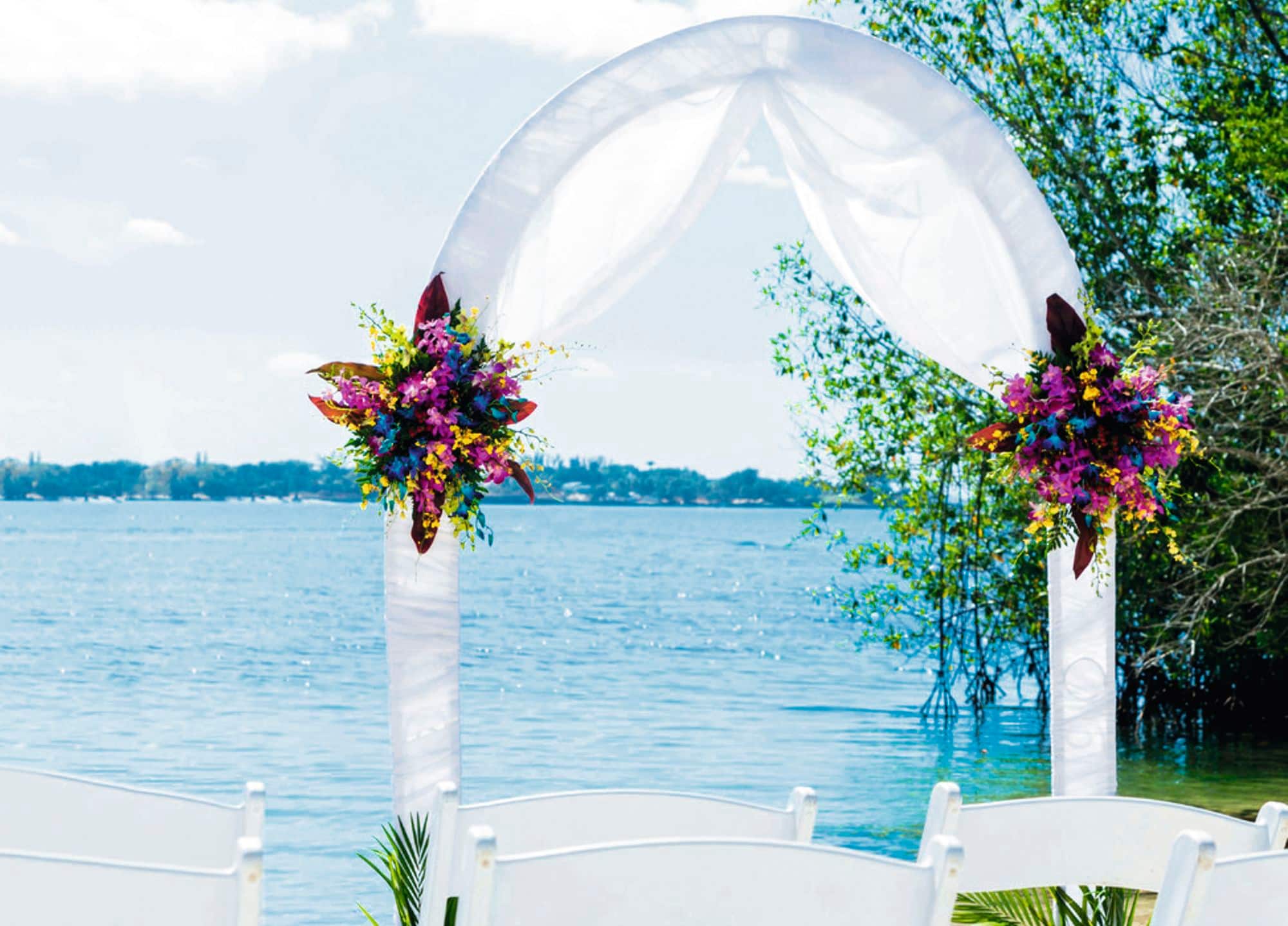 A wedding ceremony set-up looking on to the sea.