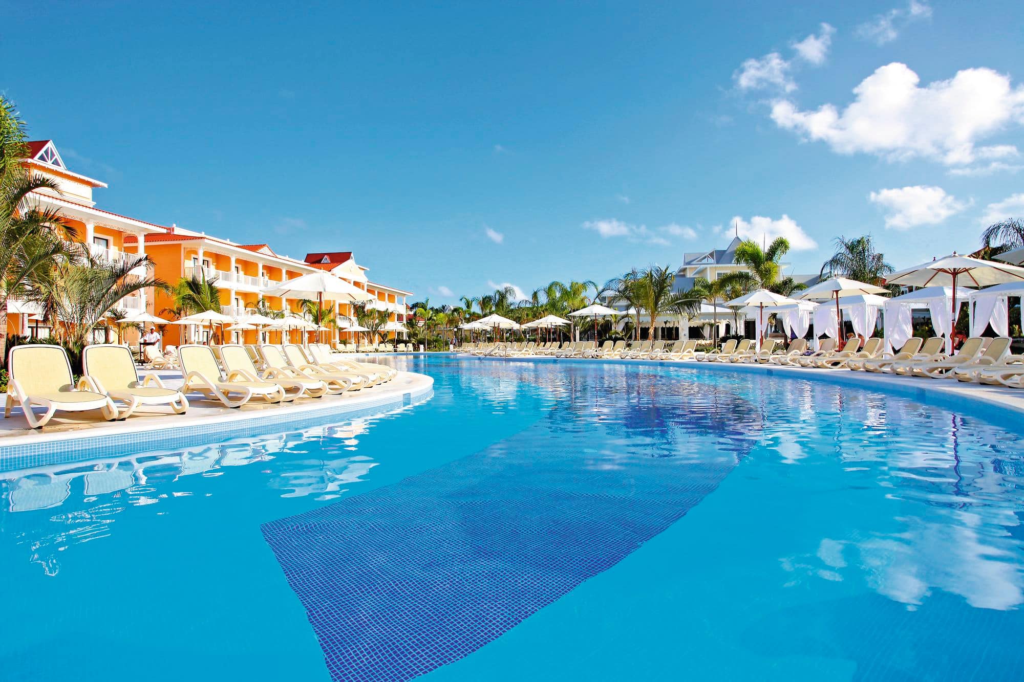The swimming pool area at the Bahia Principe Escape Aquamarine.