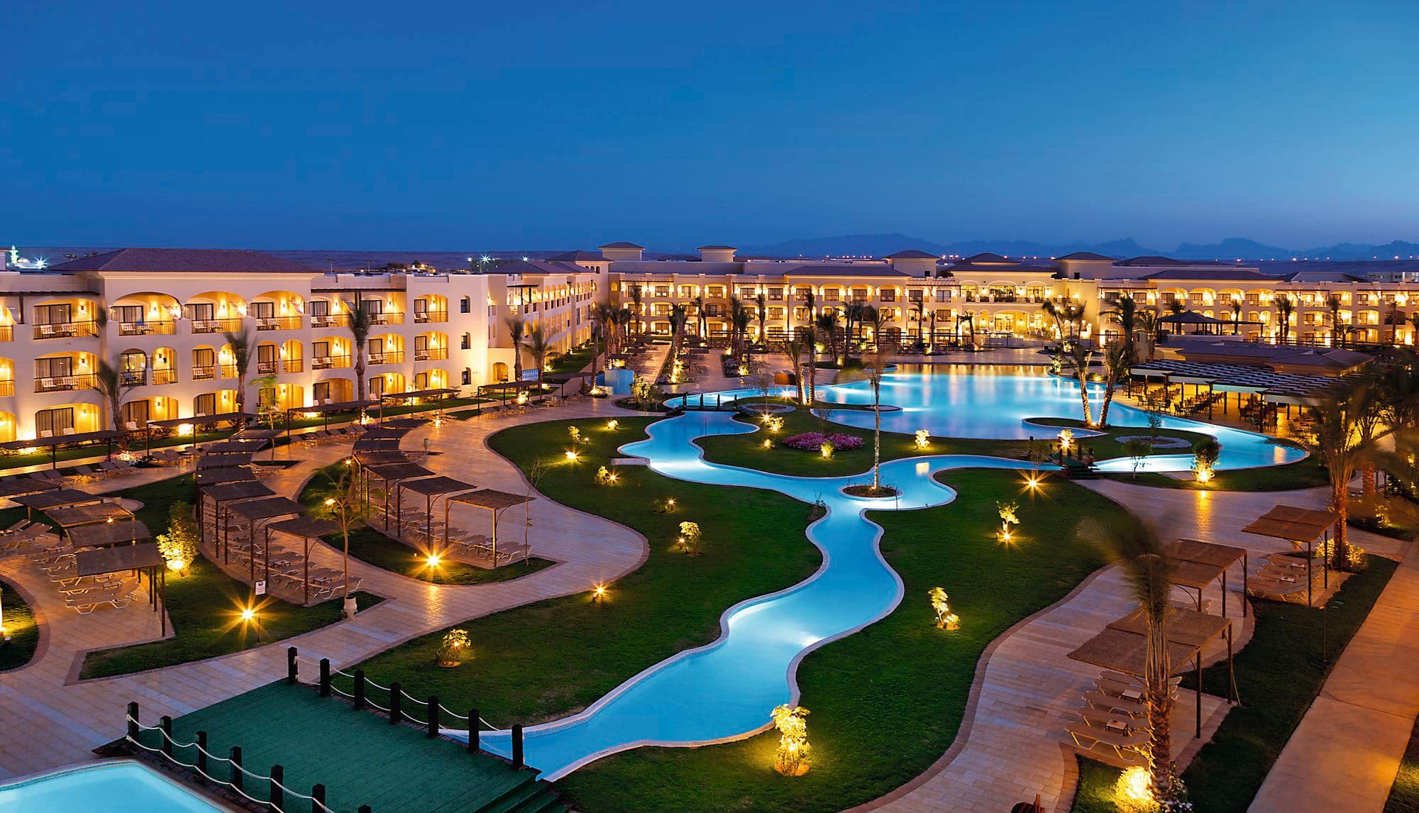 Aerial twilight view of luxury resort.