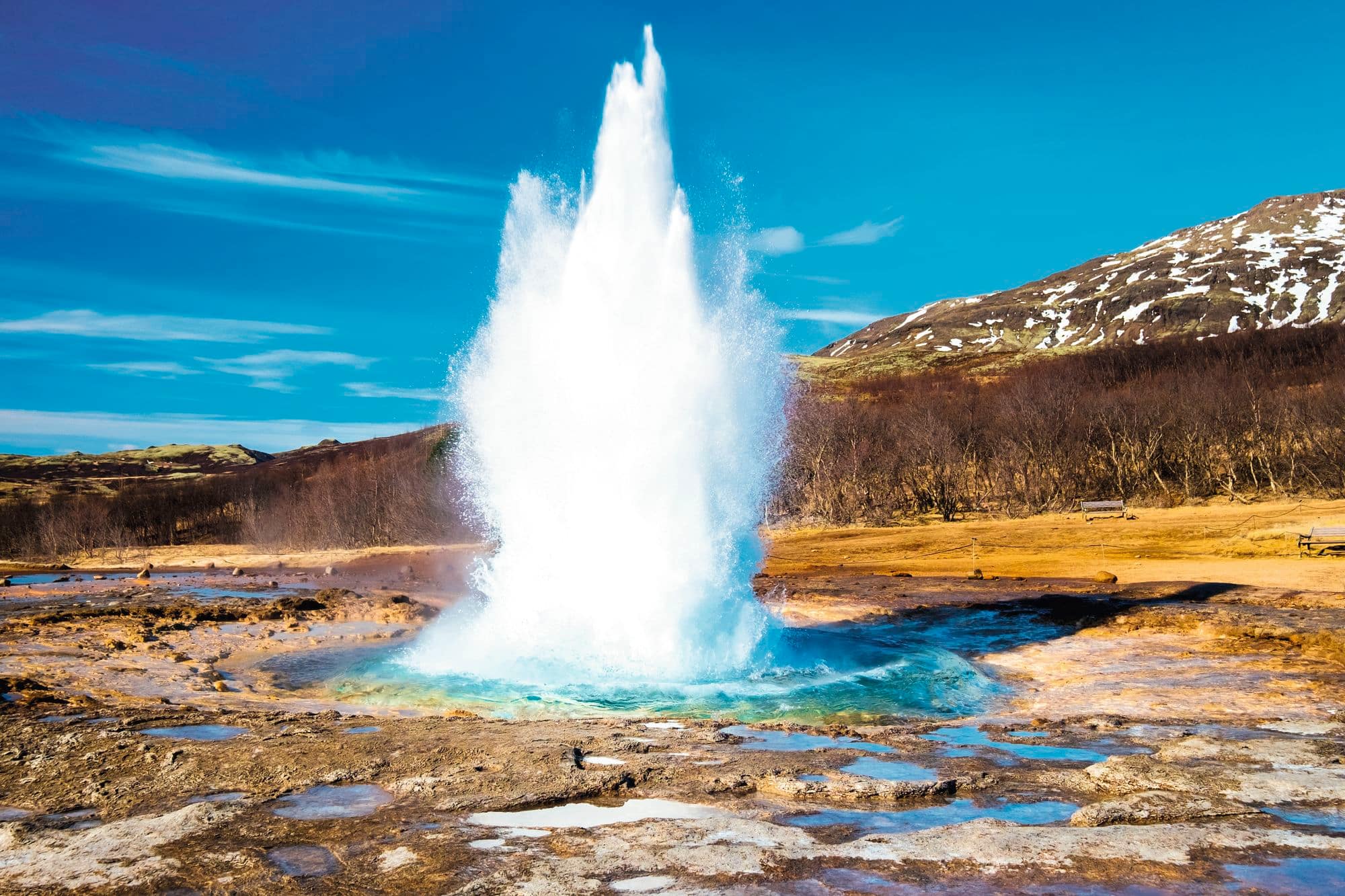 Strokkur Geyser erupting in the Golden Circle, Iceland.