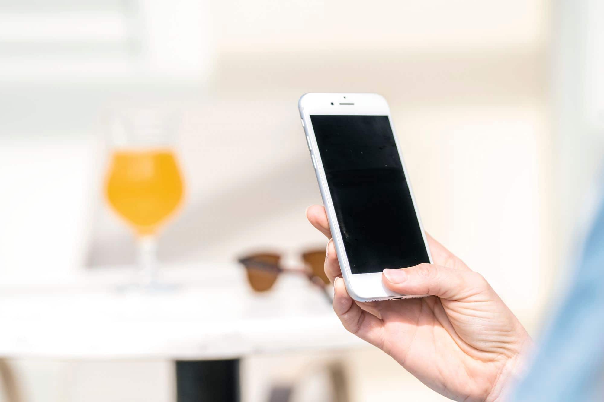 A close-up of a person using a phone.