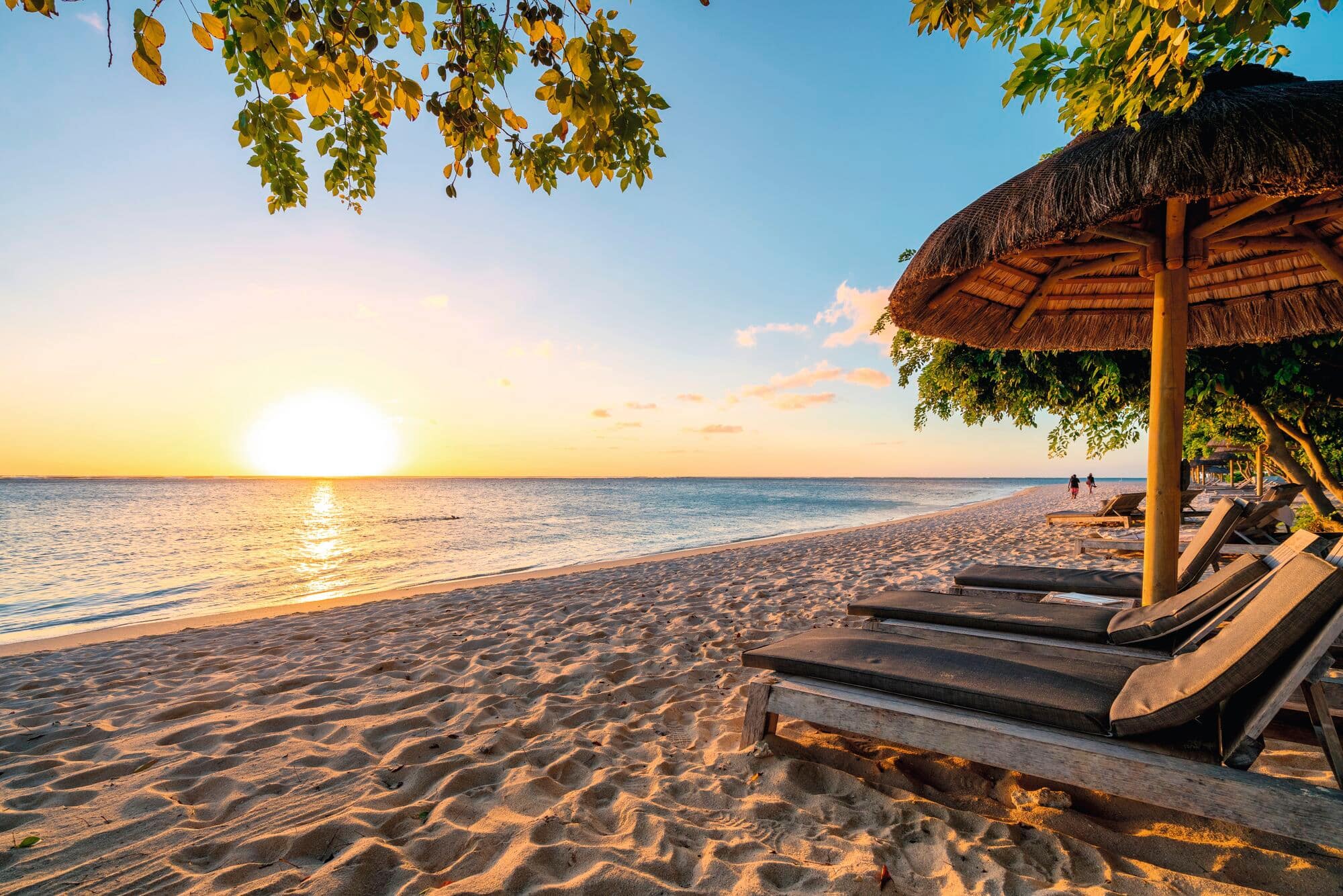 A sunset view of a beach in Mauritius.