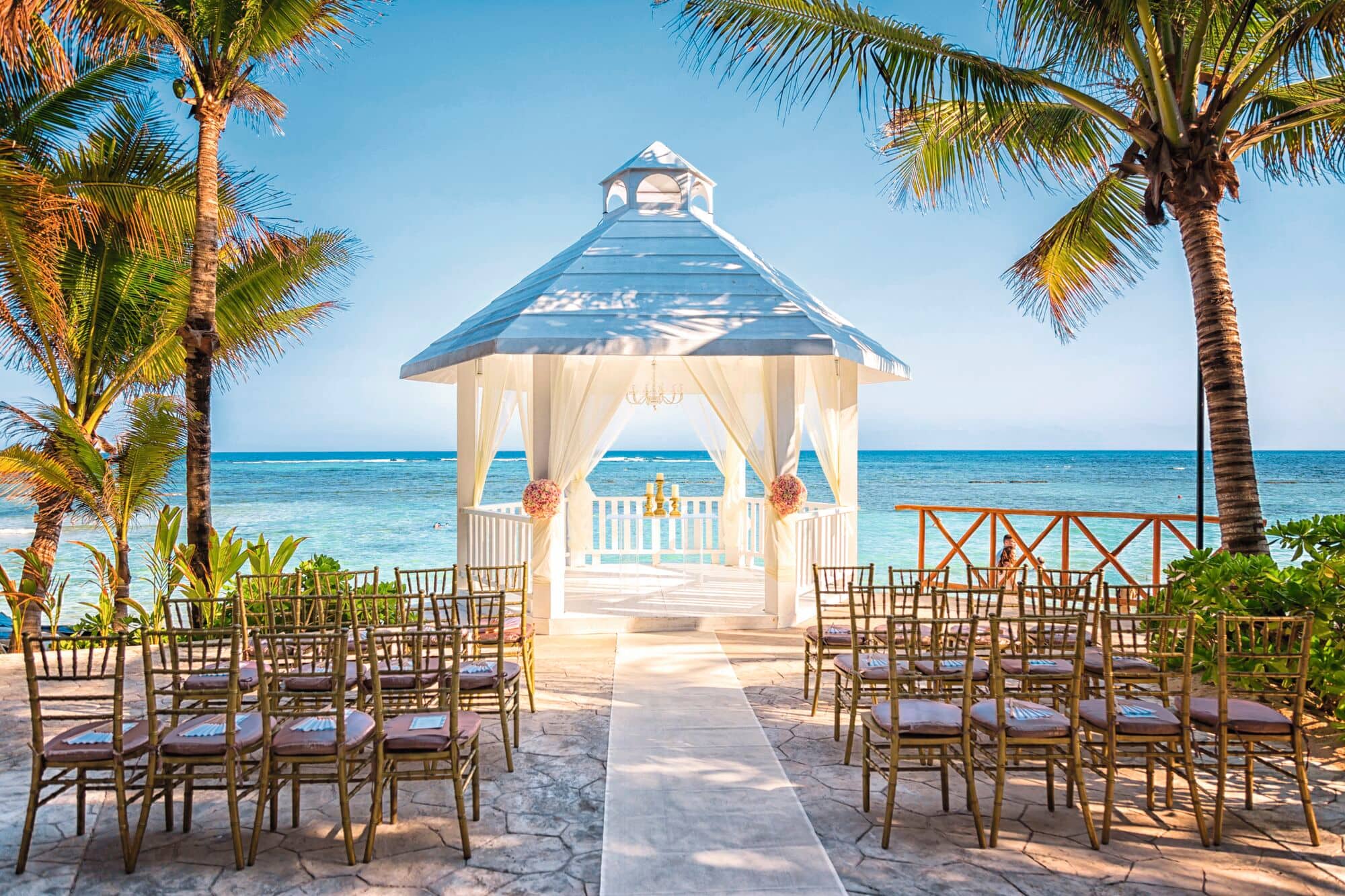 A wedding gazebo looks out to the sea at TUI BLUE El Dorado Seaside Suites Resort, Mexico.