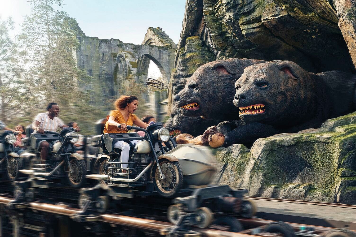 Motorbike coaster zooms past giant bears – wild rides and roaring adventure await.