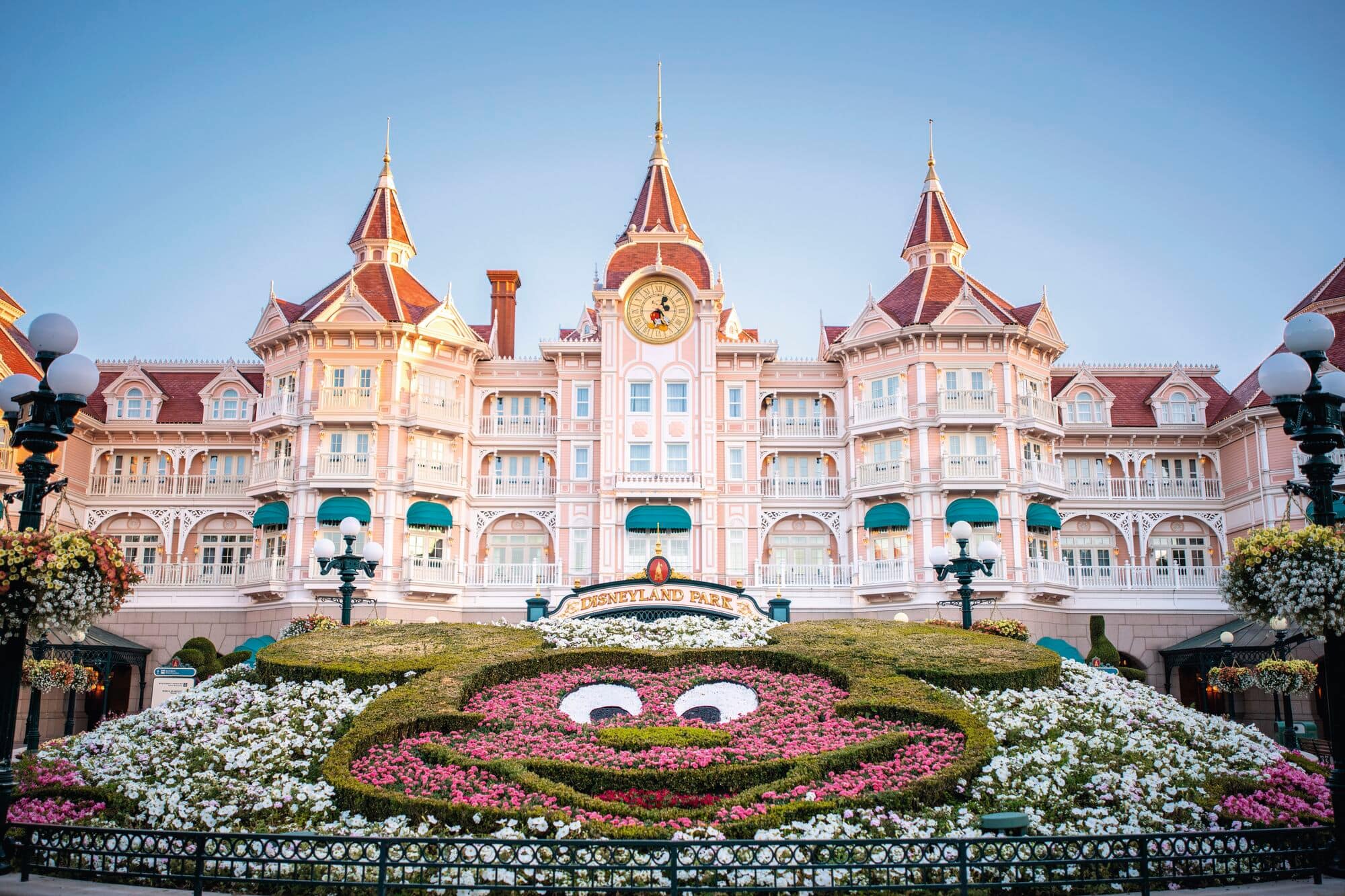 Mickey Mouse themed flowers in front of the Disneyland Paris entrance.