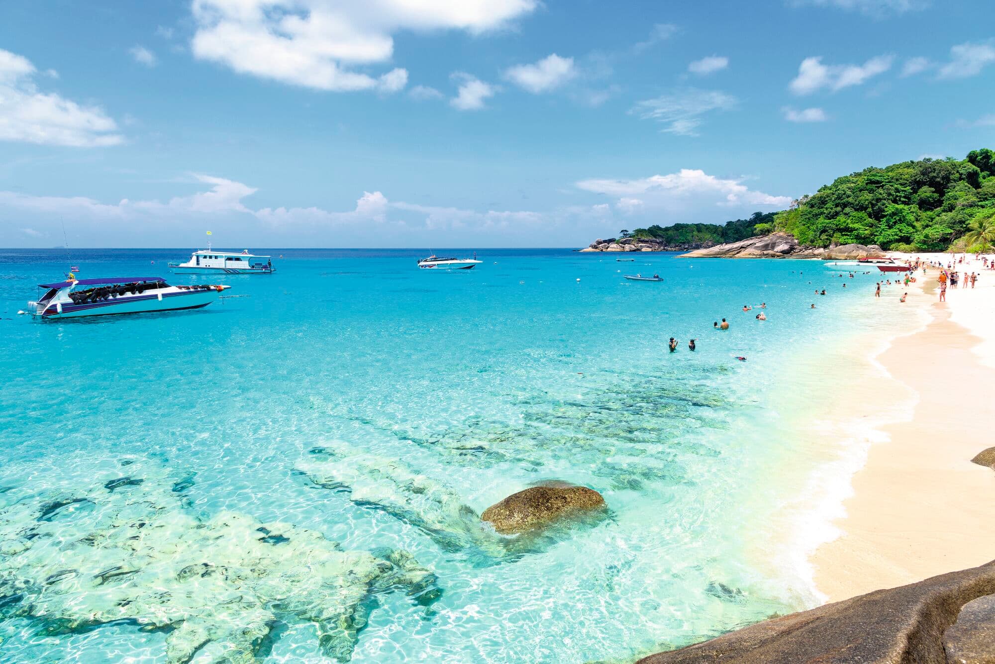 Golden beach and clear blue sea at Koh Miang island in Mu Ko Similan National Park, Thailand.