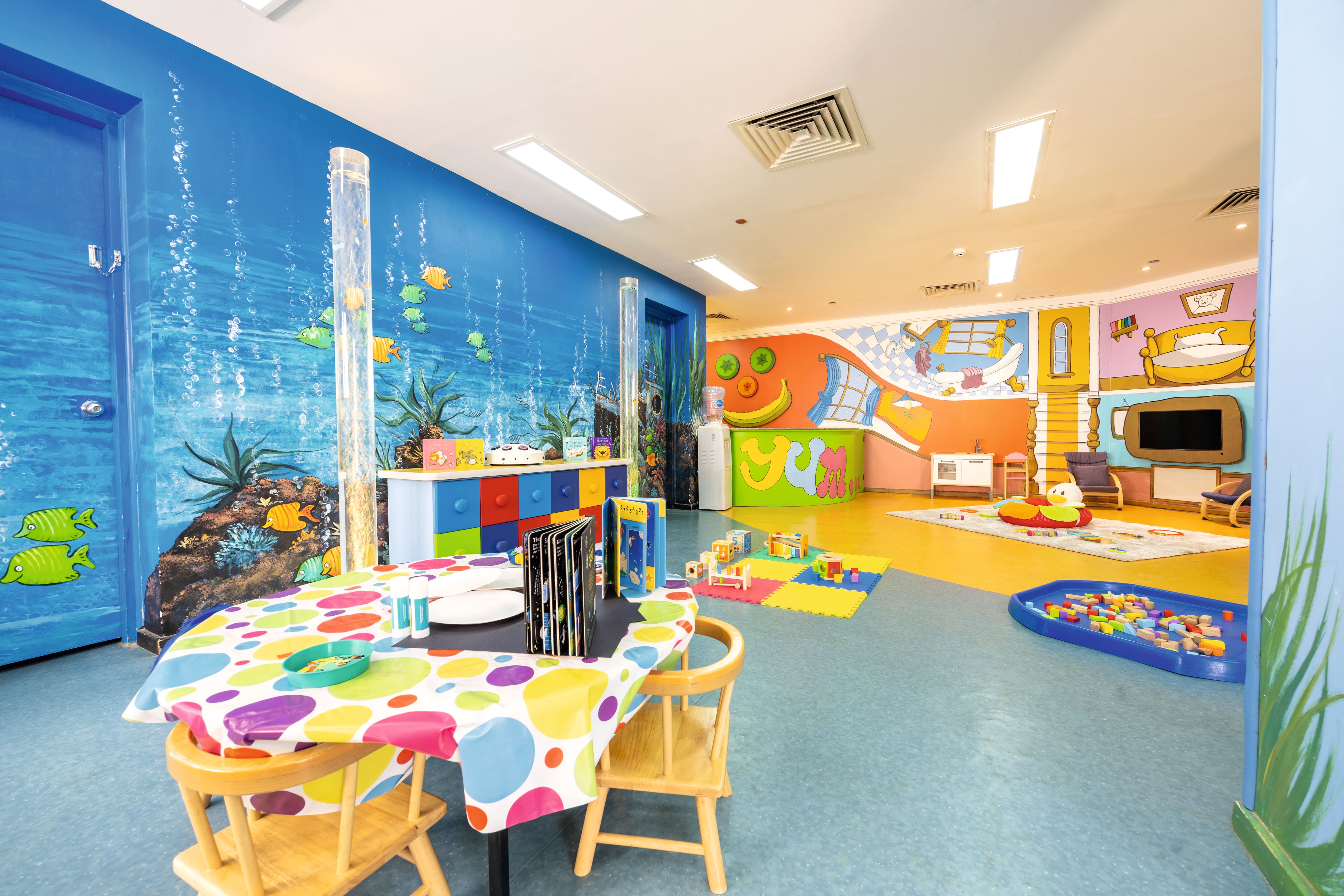 Bright, colourful Kids club room.