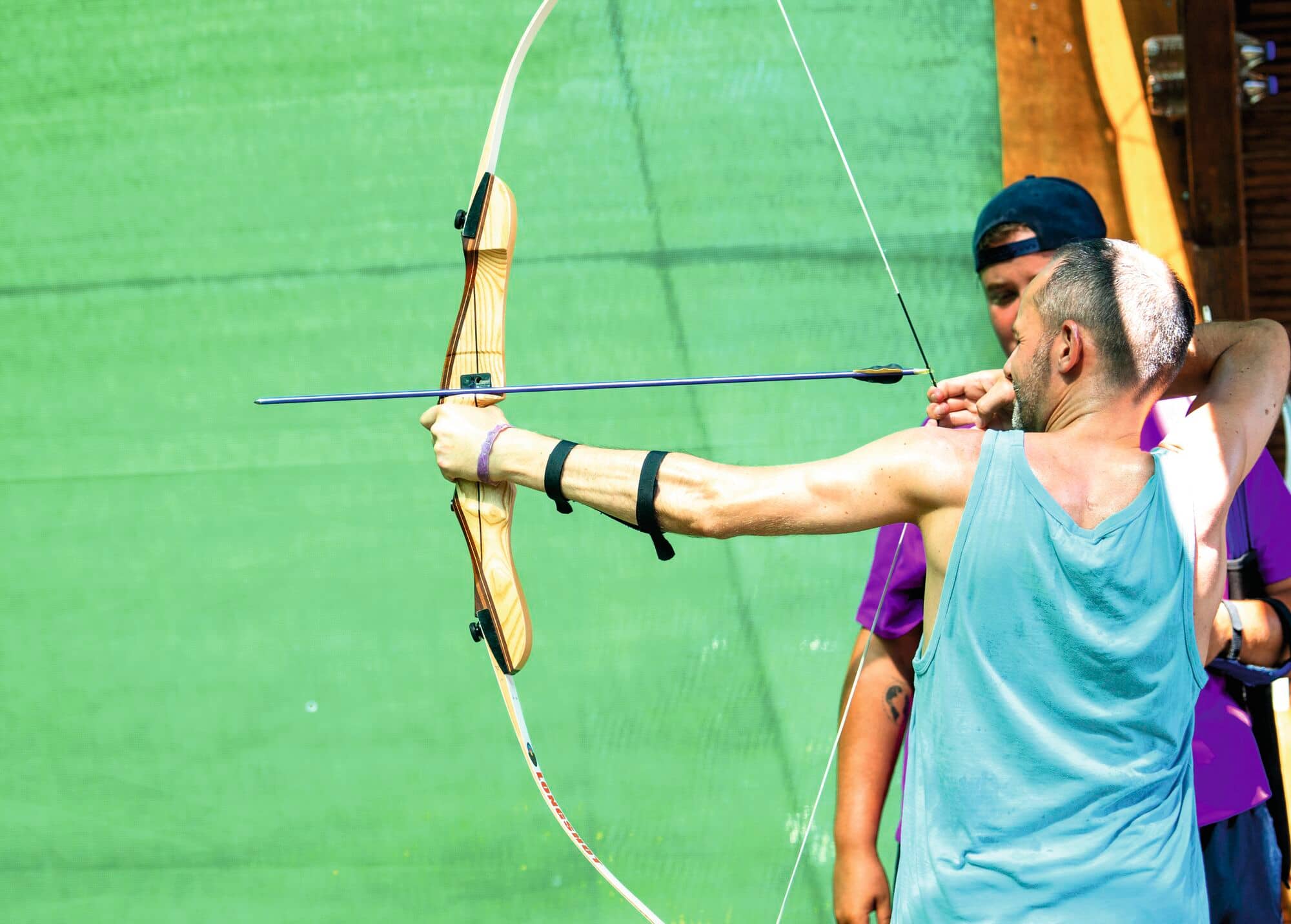 A Man doing some archery.