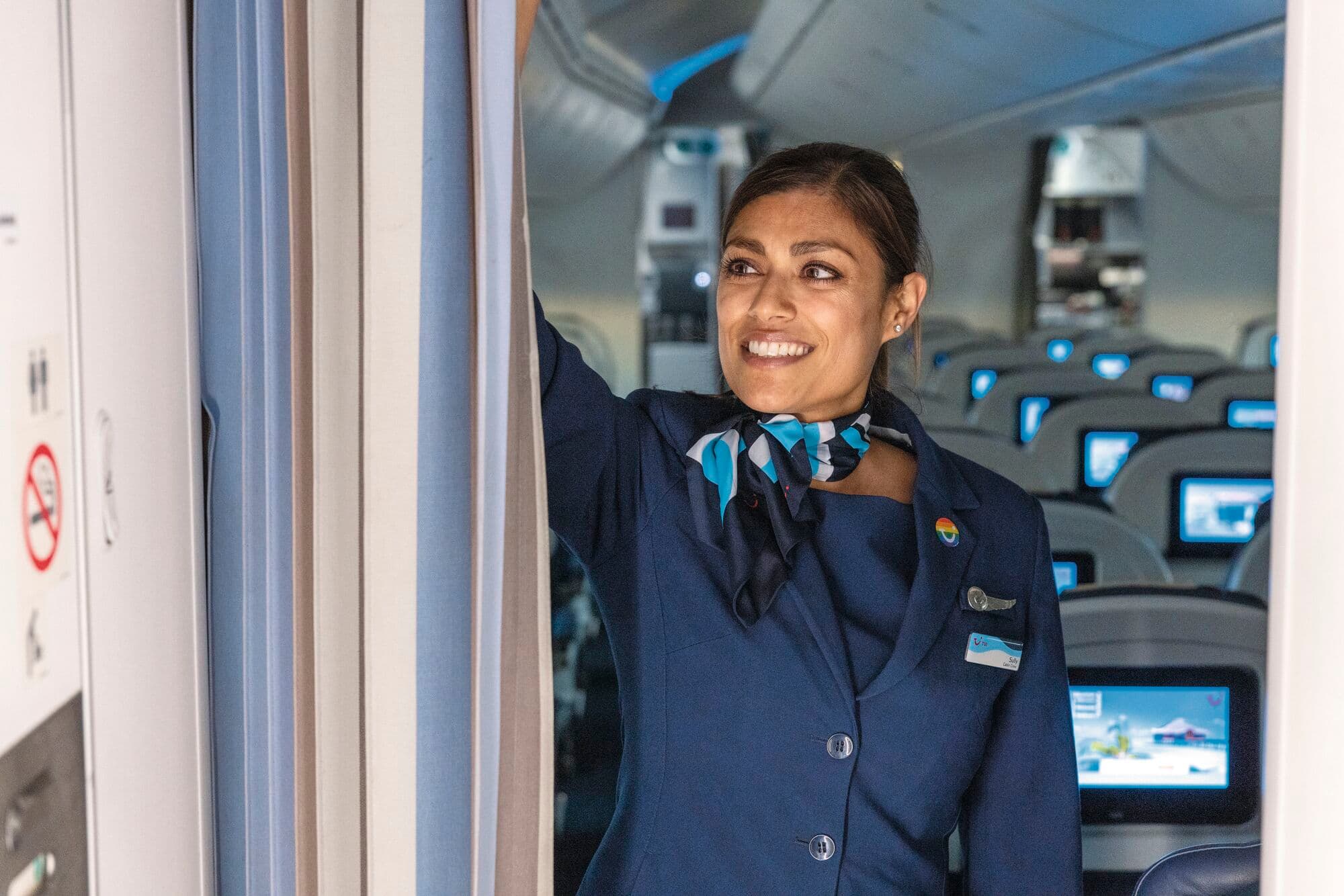 A member of cabin crew on a TUI plane.