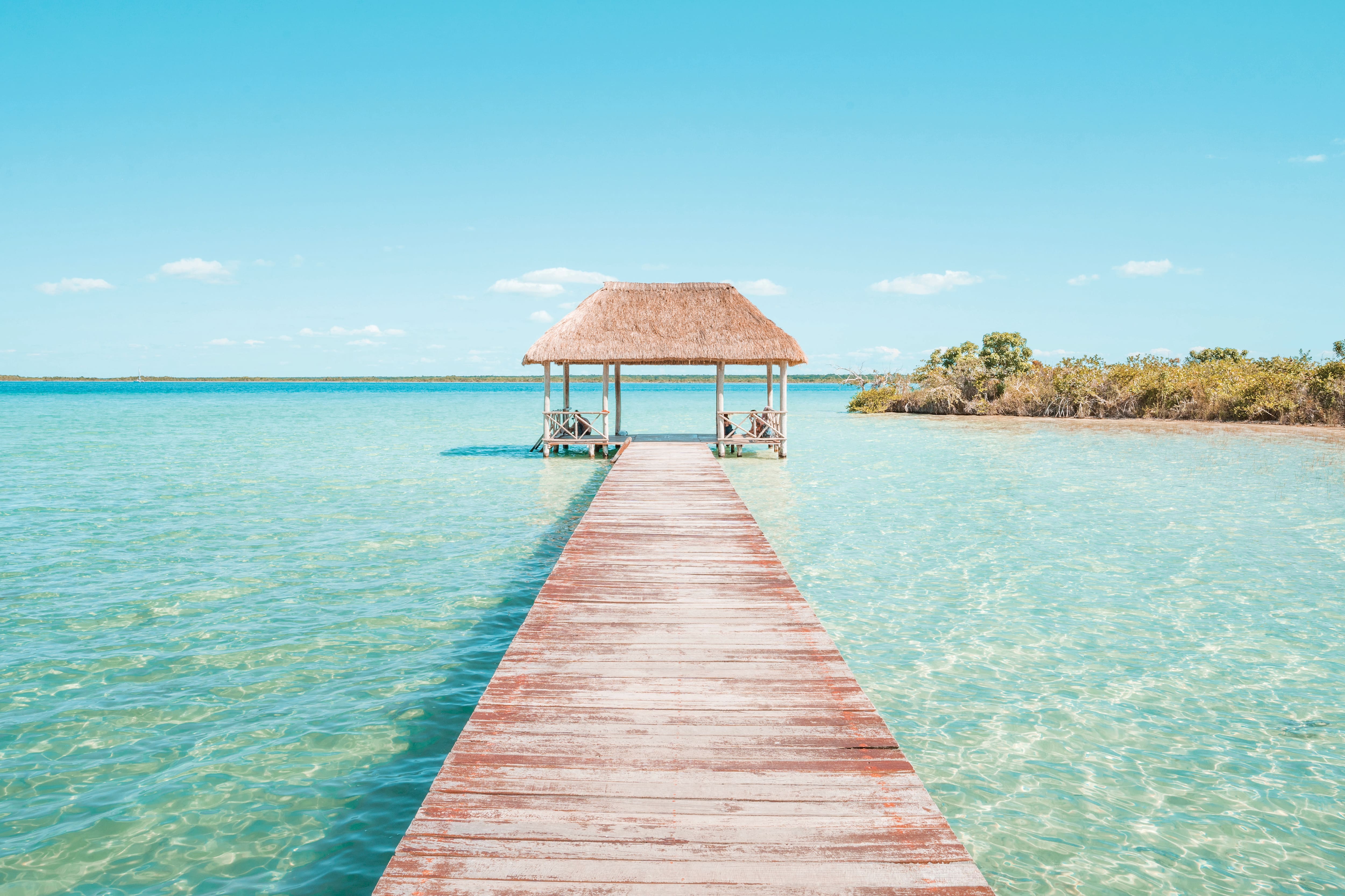 A wooden walk way into the sea 