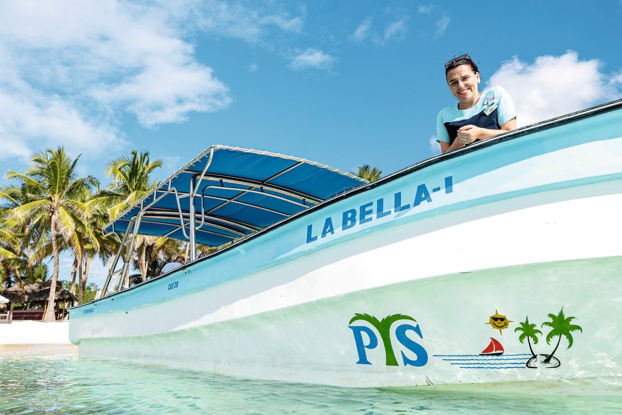 An in-resort team member on a boat in Isla Soana, Dominican republic.