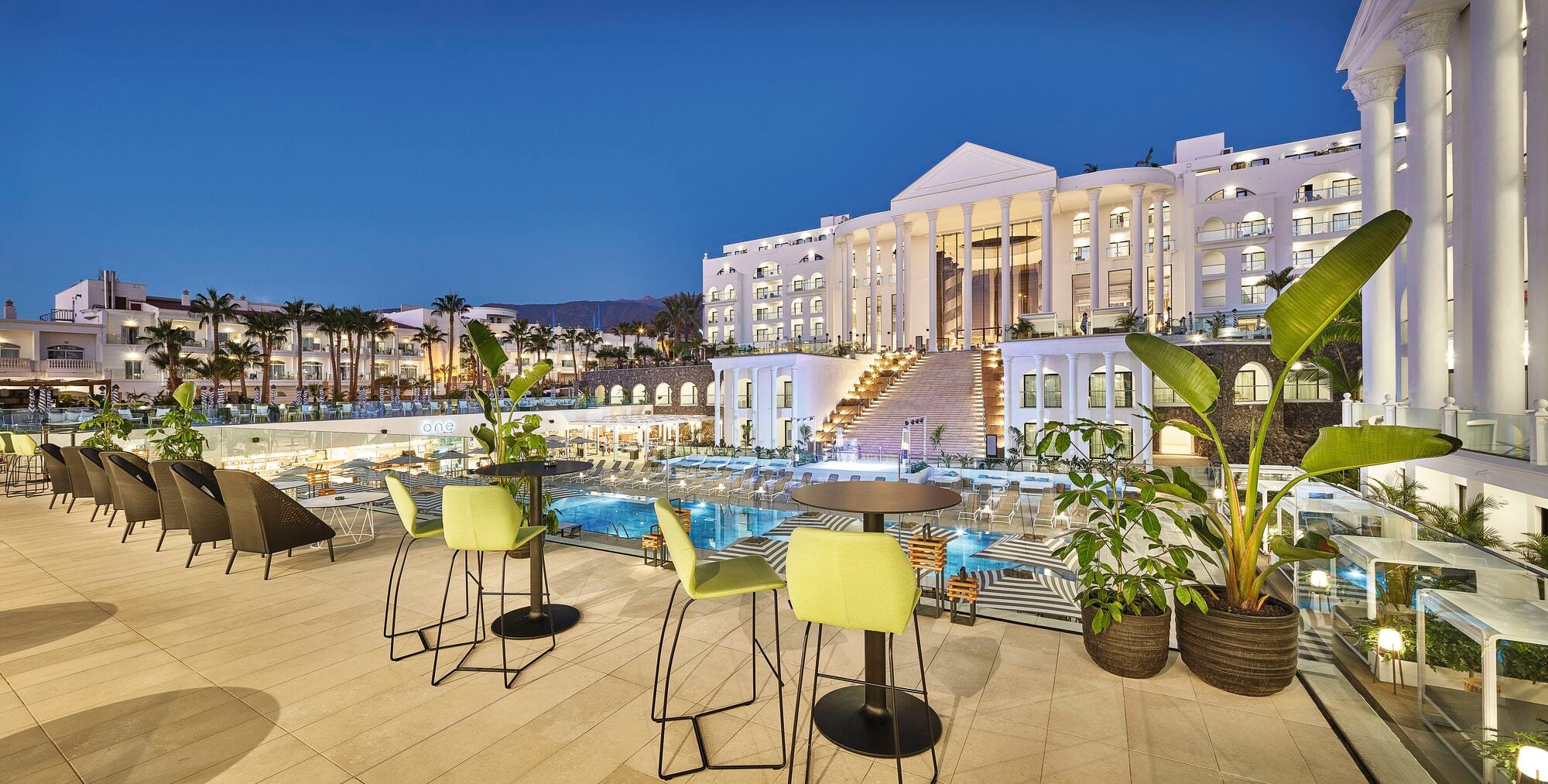 A view of terrace and pool at Princess Inspire Tenerife Hotel in Tenerife.