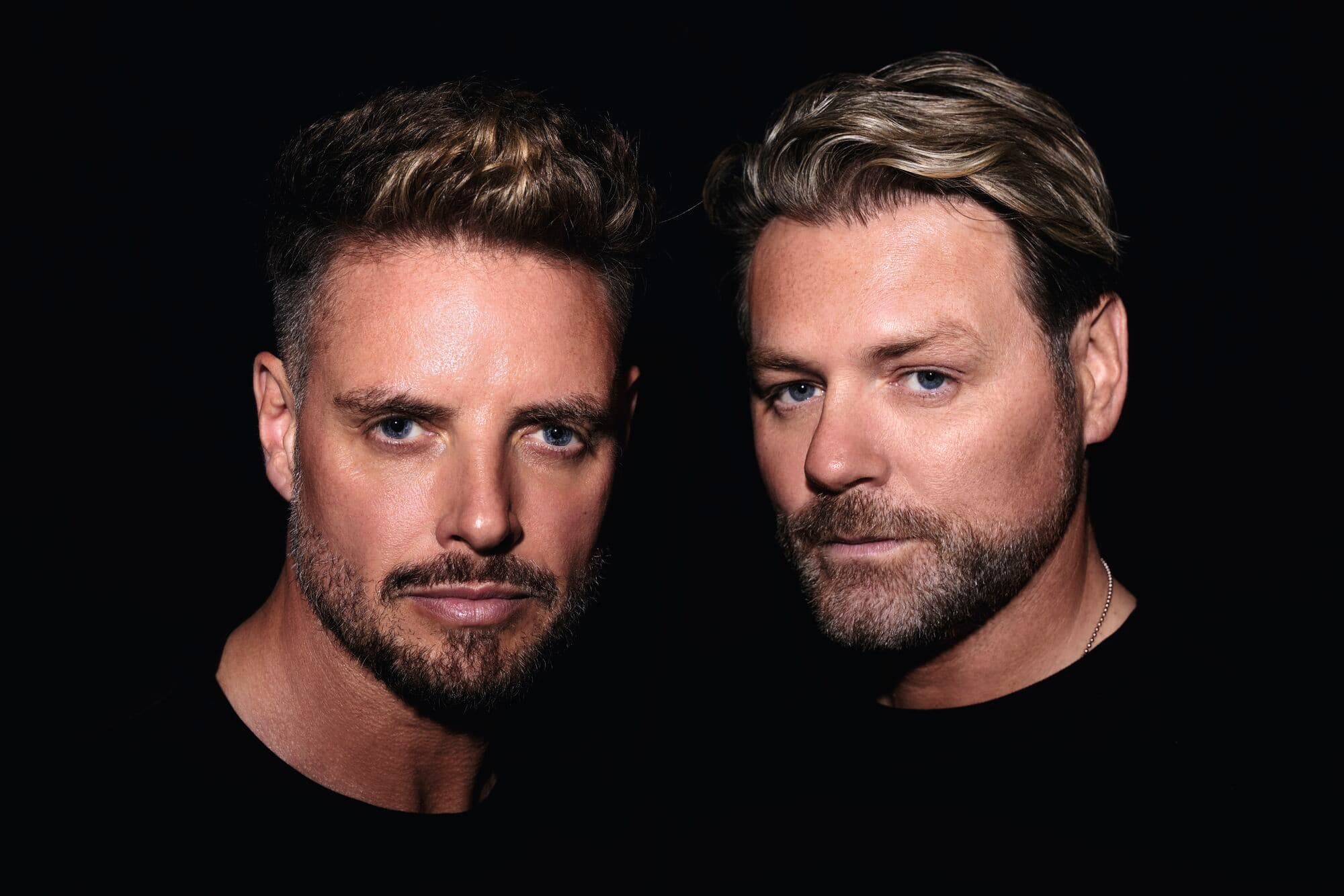 A headshot of Keith Duffy and Brian McFadden from Boyzlife.
