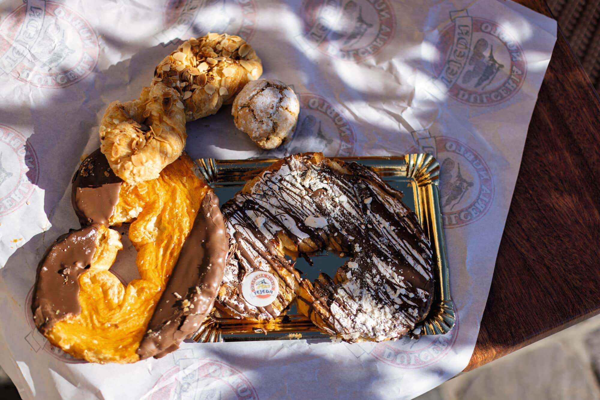 Pastries covered in chocolate.