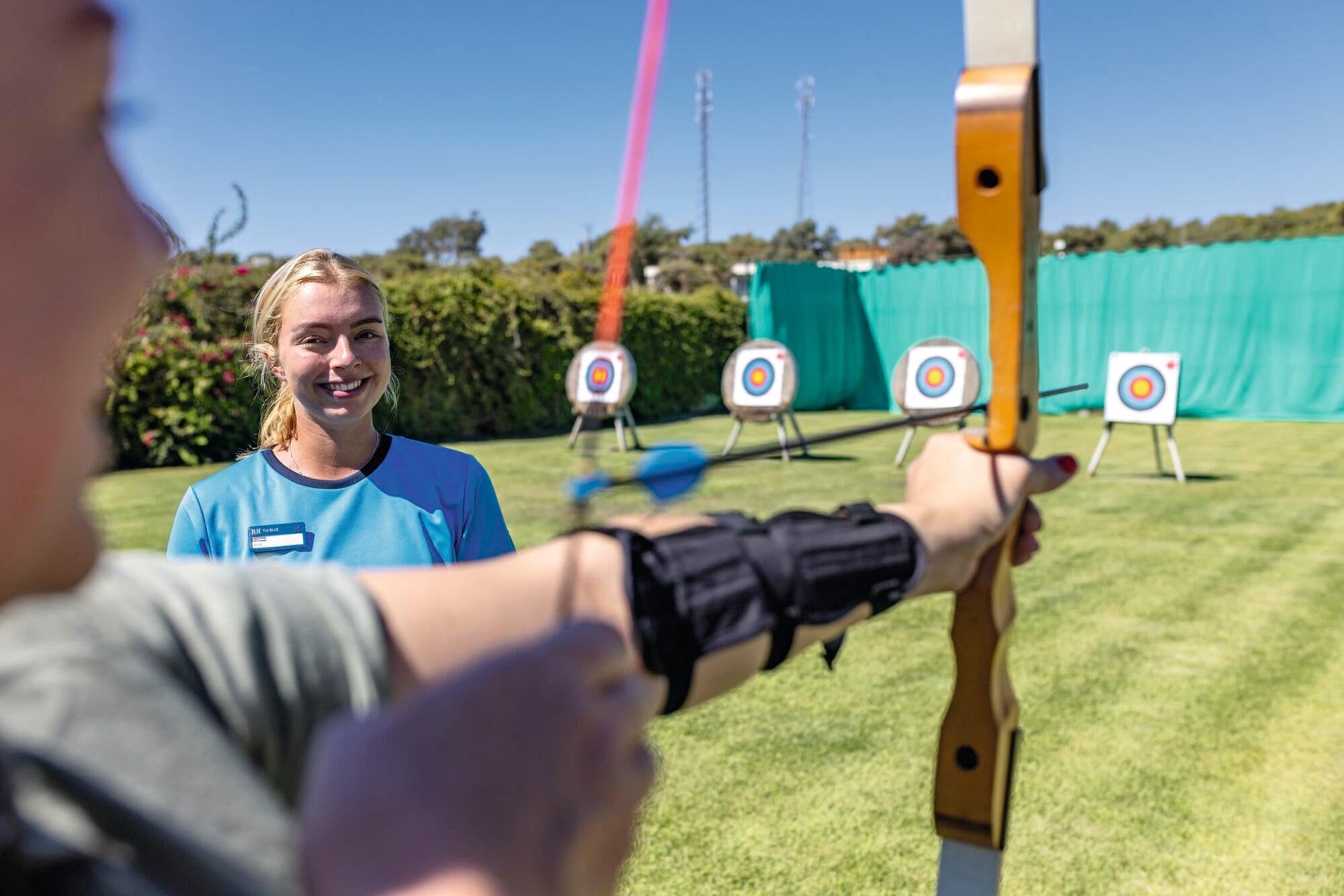 Woman playing archery.