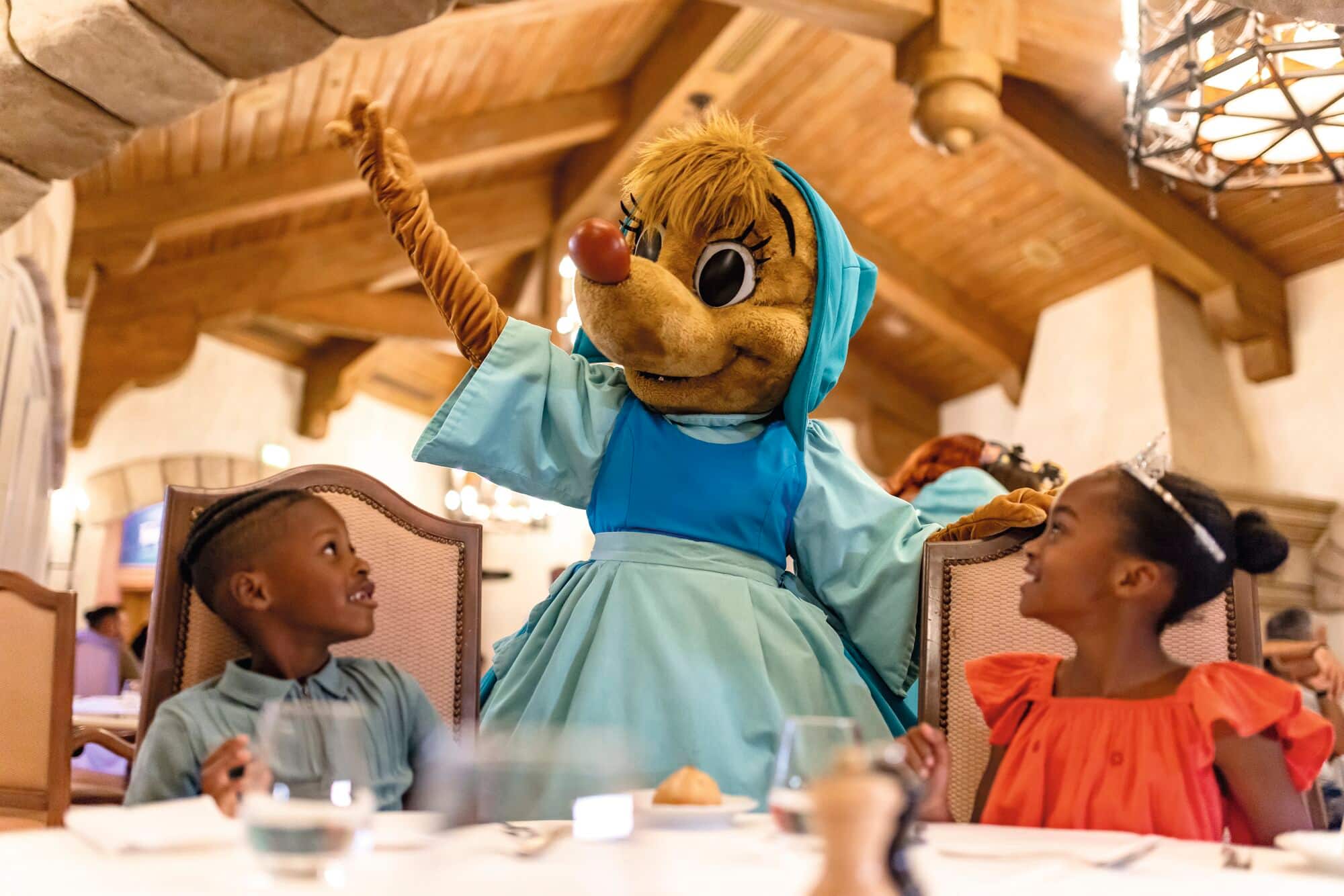 Children at a table for Disney Character Dining.