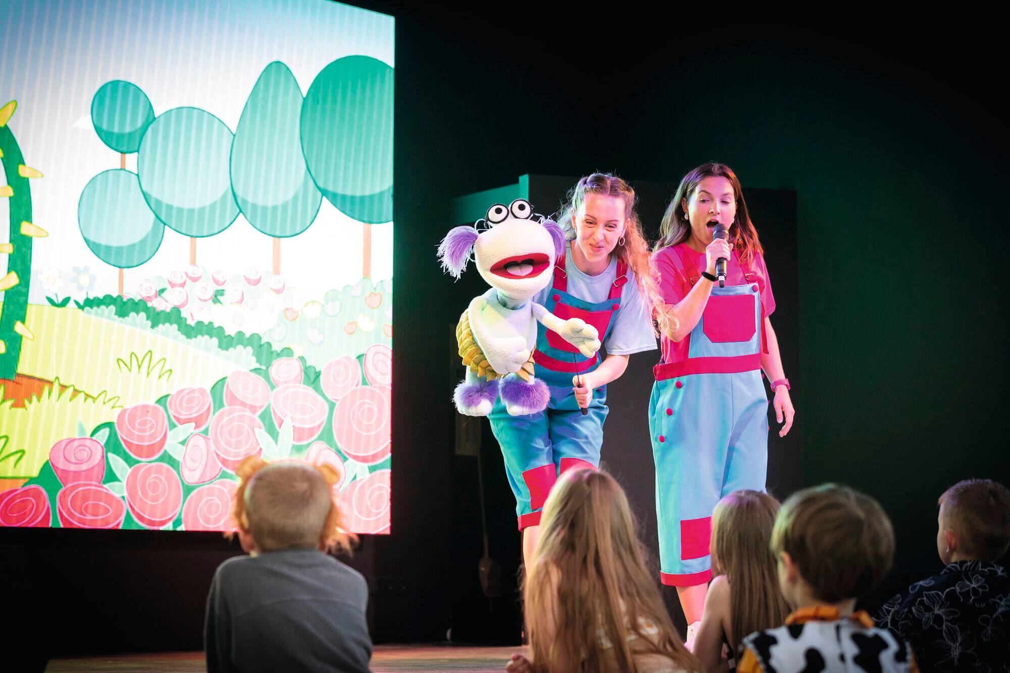 Entertainers performing on stage.