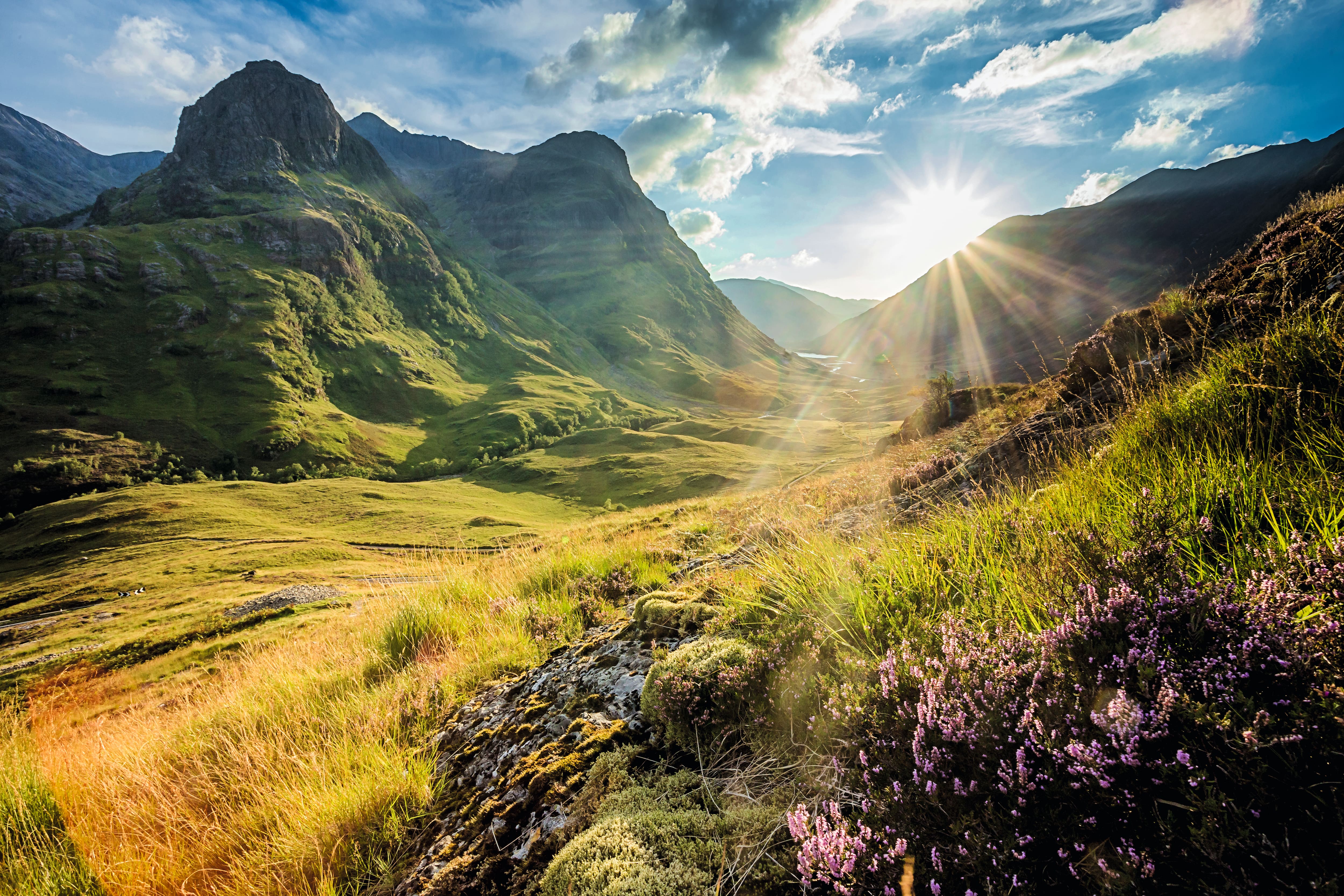 The sun shining on the Scottish Highlands.