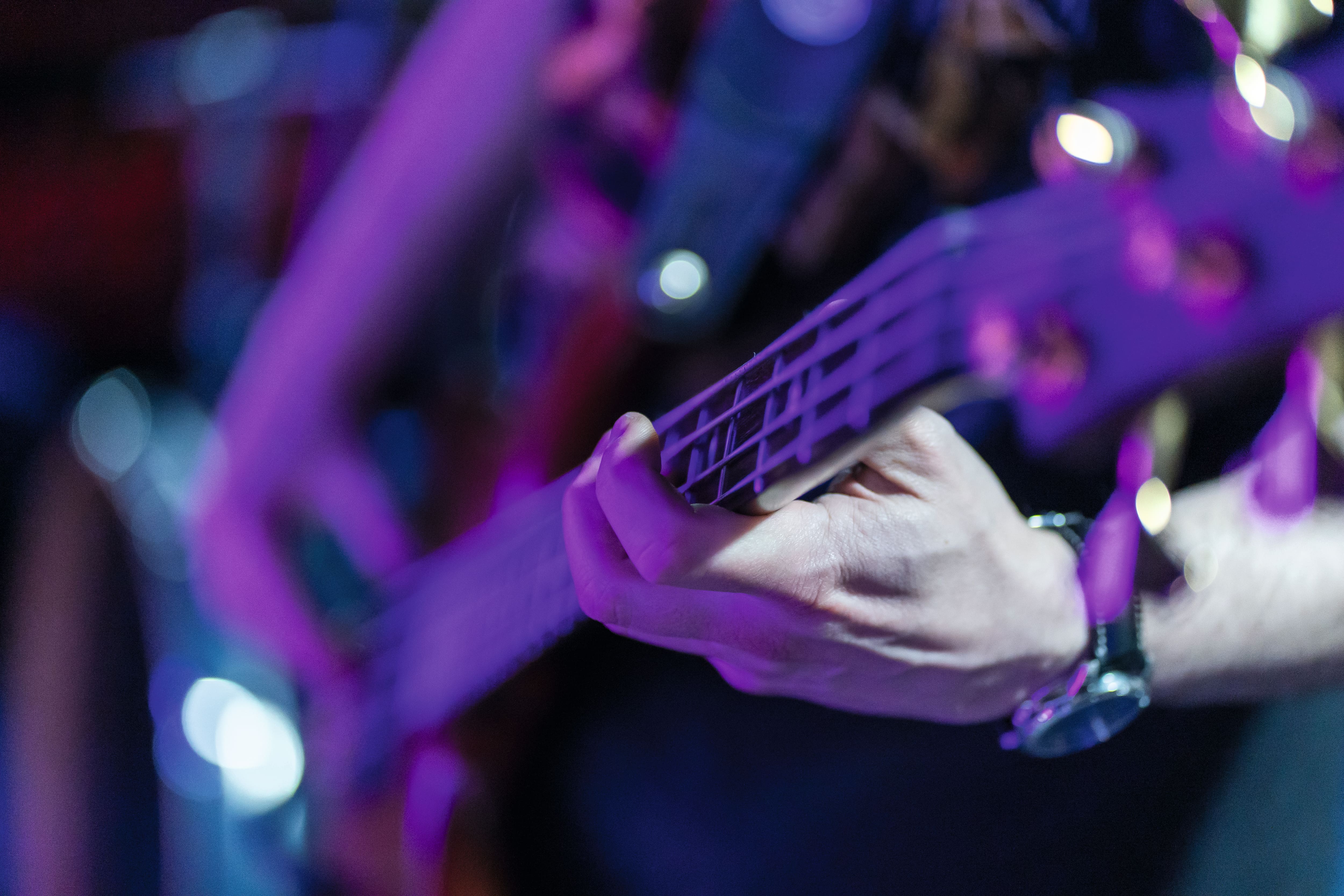 Man playing guitar.