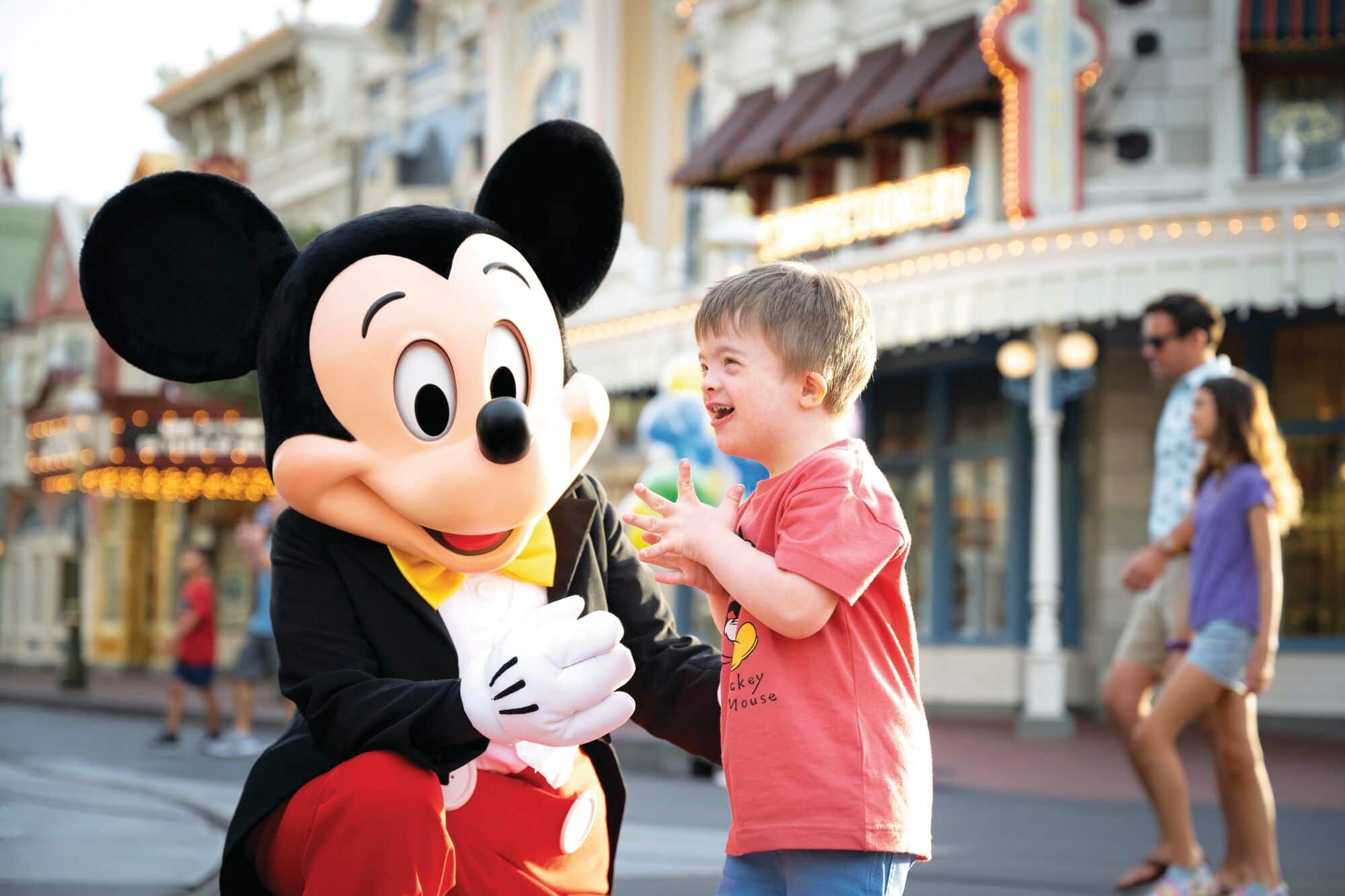 A child with Micky Mouse.