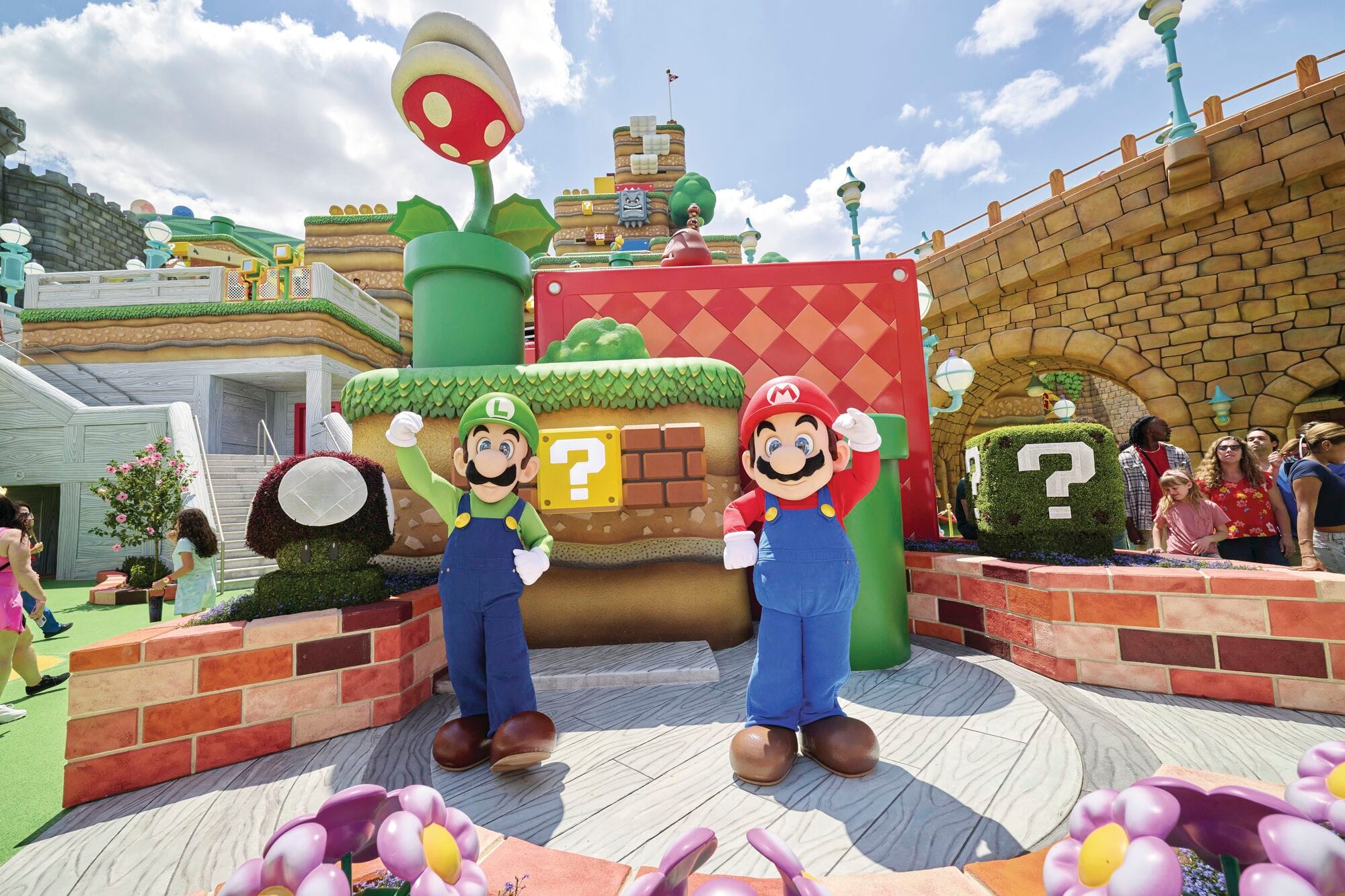 Mario and Luigi waving.