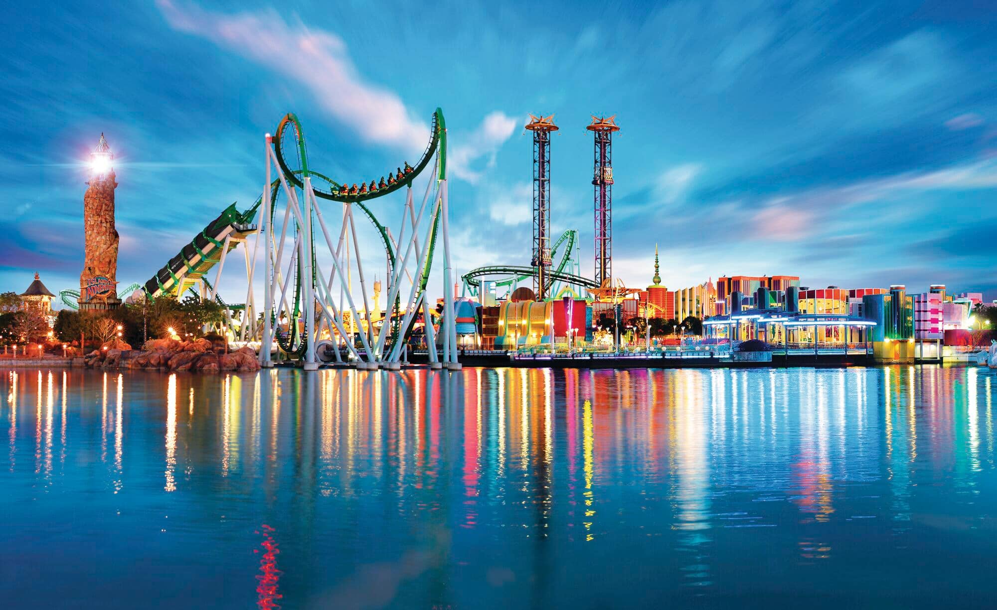 Roller coasters and sunset reflections – theme park magic as the day winds down.