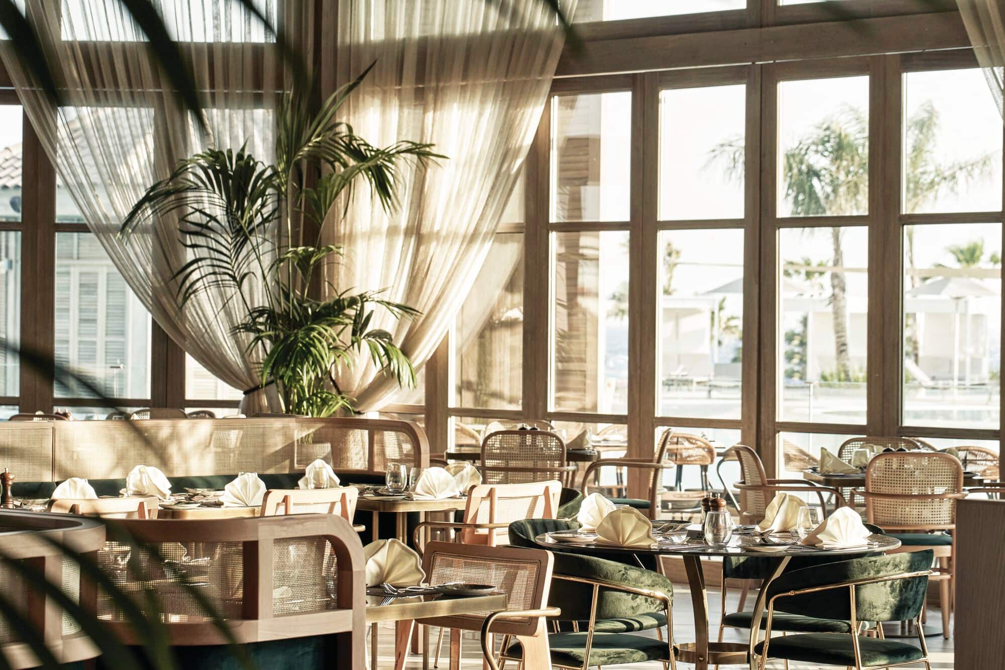 A restaurant decorated in neutral tones.