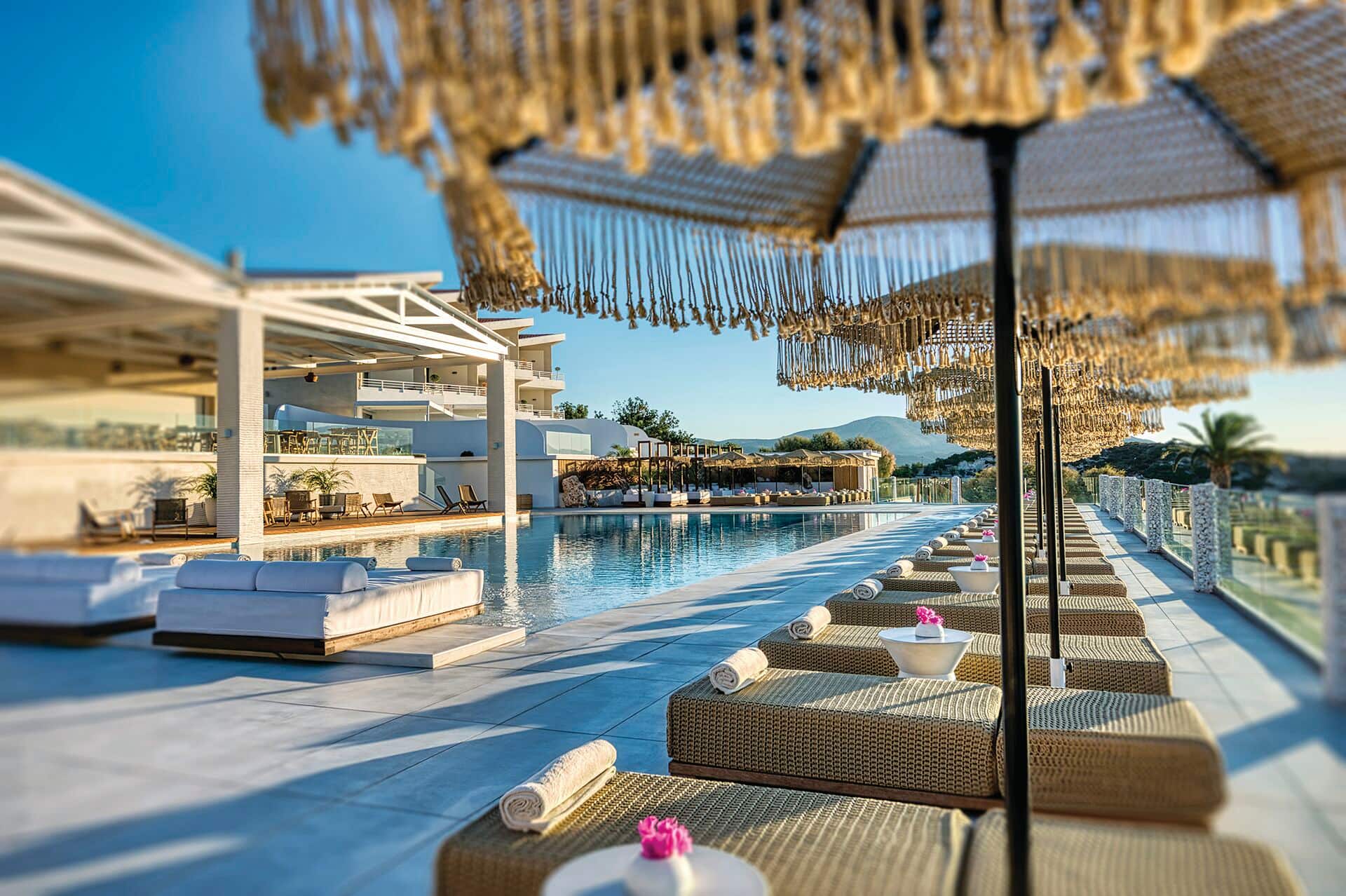 A stylish pool area with mountain views.