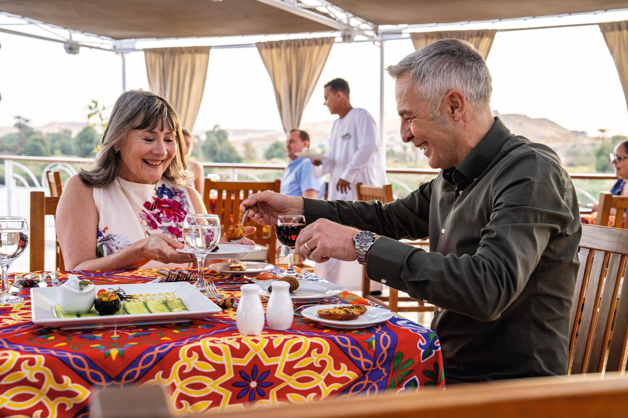 Customers enjoying a top deck dining experience on board the TUI Al Horeya.