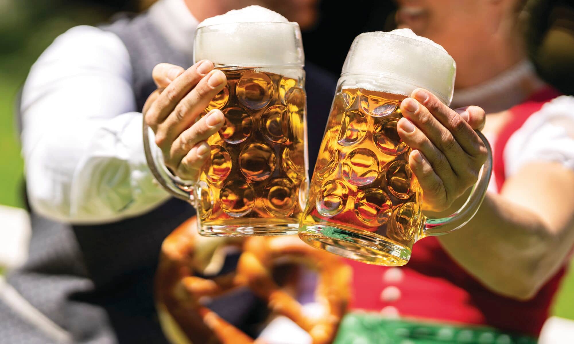 Traditional beer steins filled with lager