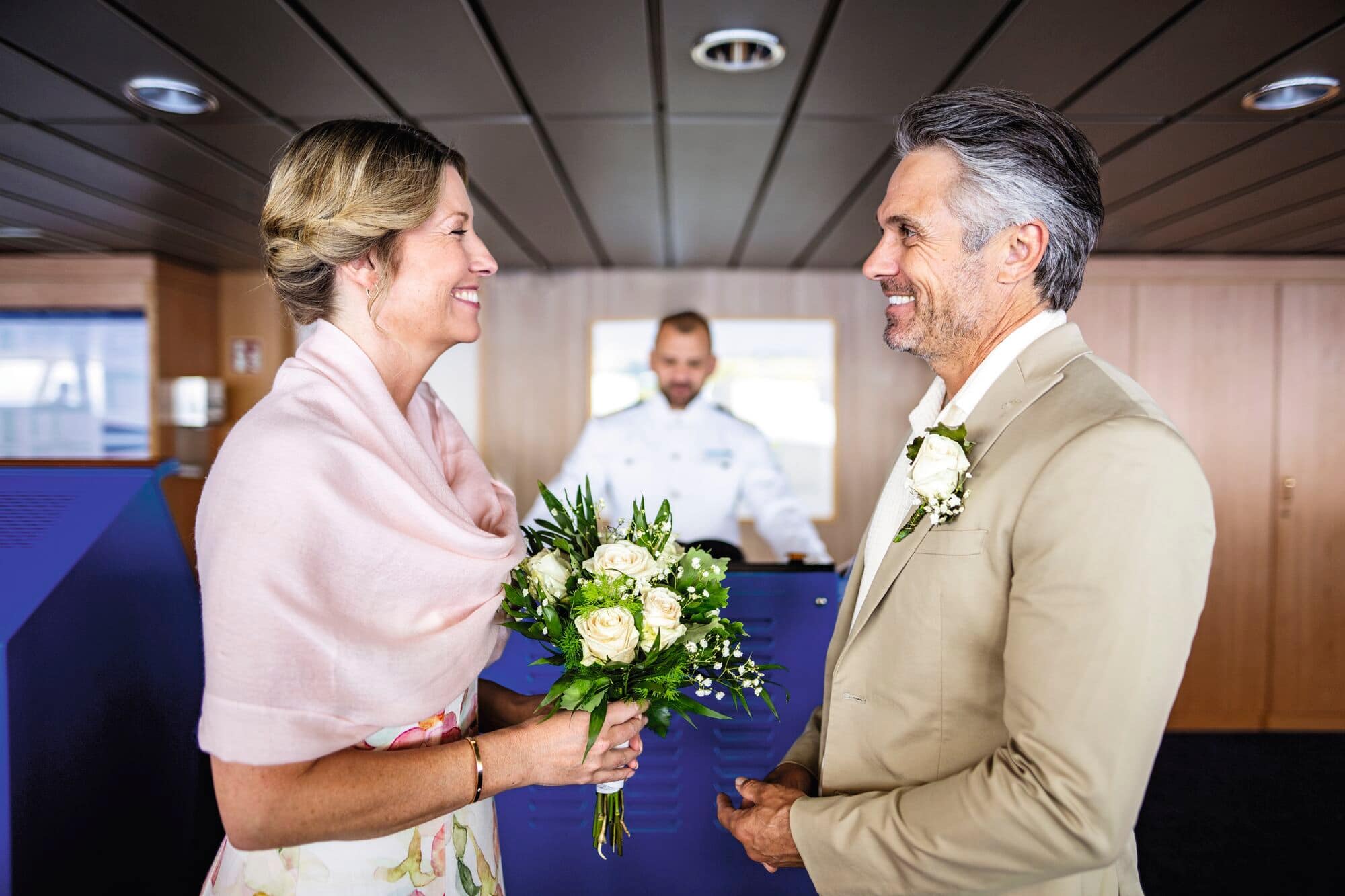 A couple exchanging vows during a renewal ceremony.