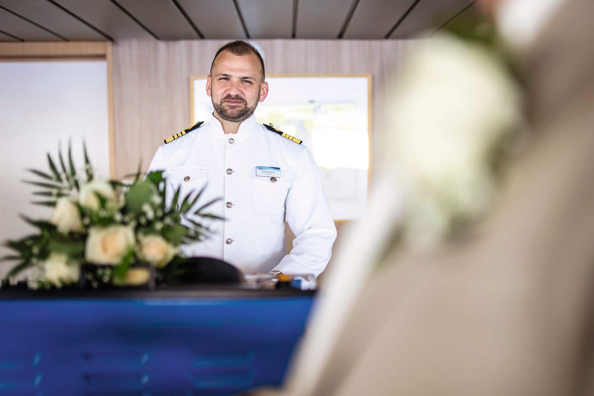 A ship Captain conducting a vow renewal service.