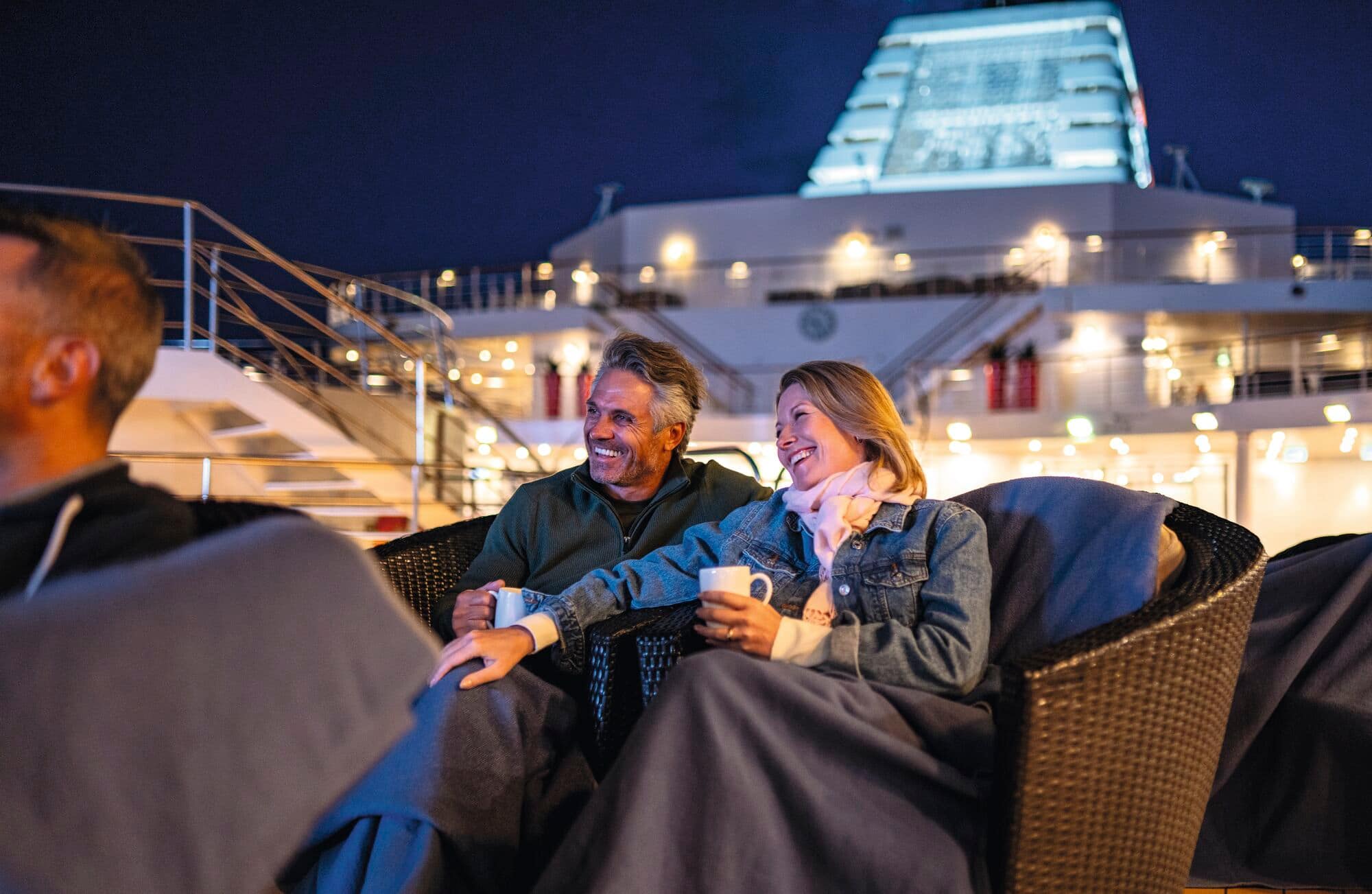 Couple sitting together in the evening