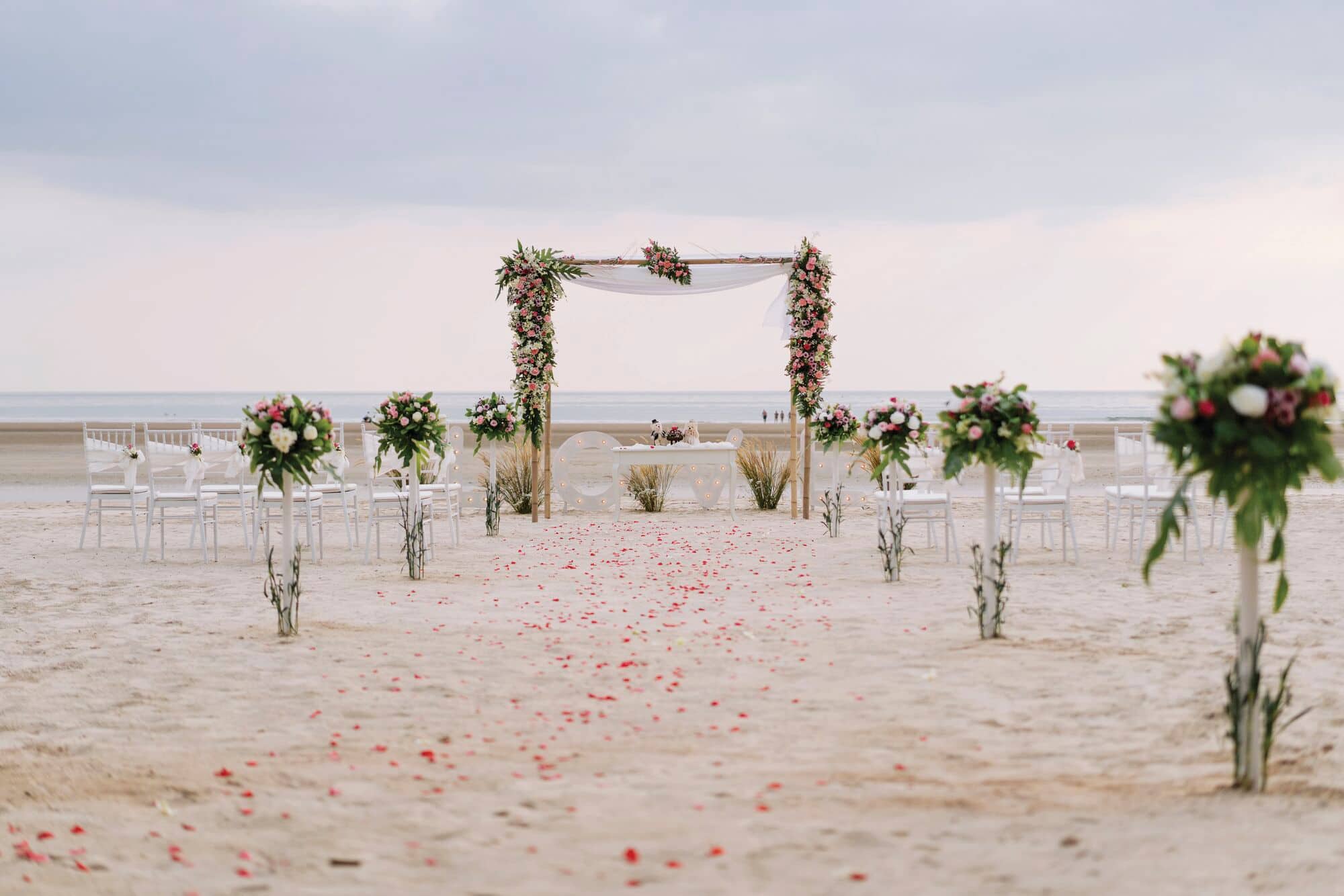 A beach wedding set-up at Apsara Beachfront Resort and Villa in Thailand.