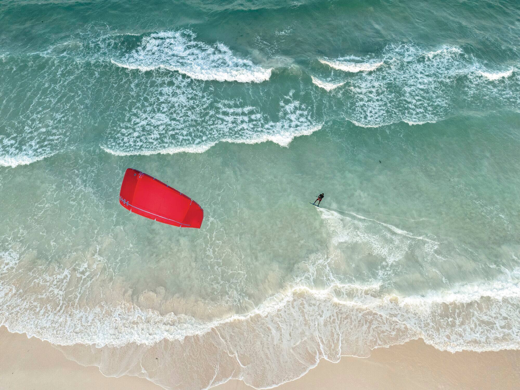 An aerial view of a kite-surfer.