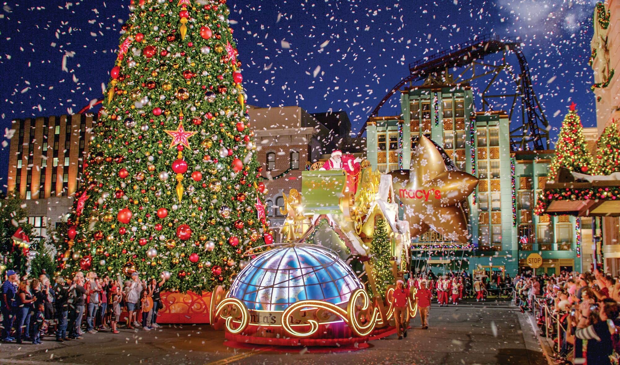 A crowd watching a Christmas parade.