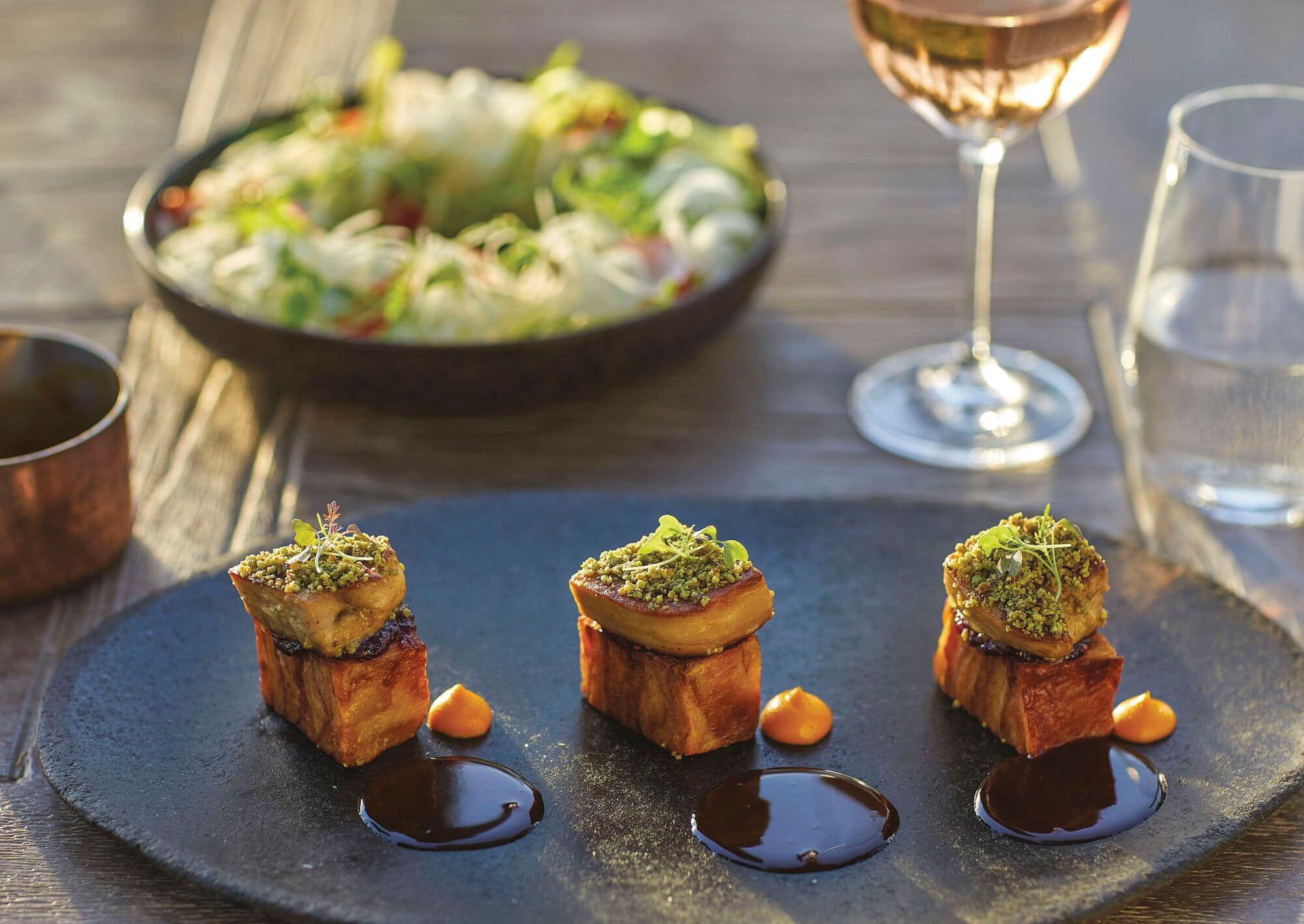 A table laid out with a variety of dishes.