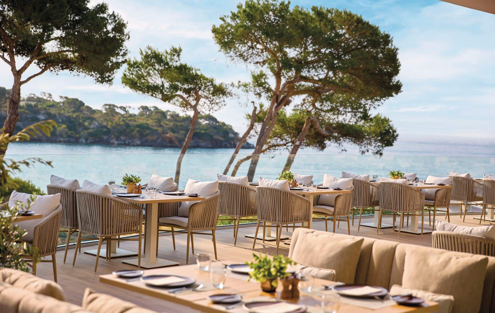An outdoor dining area by the sea.