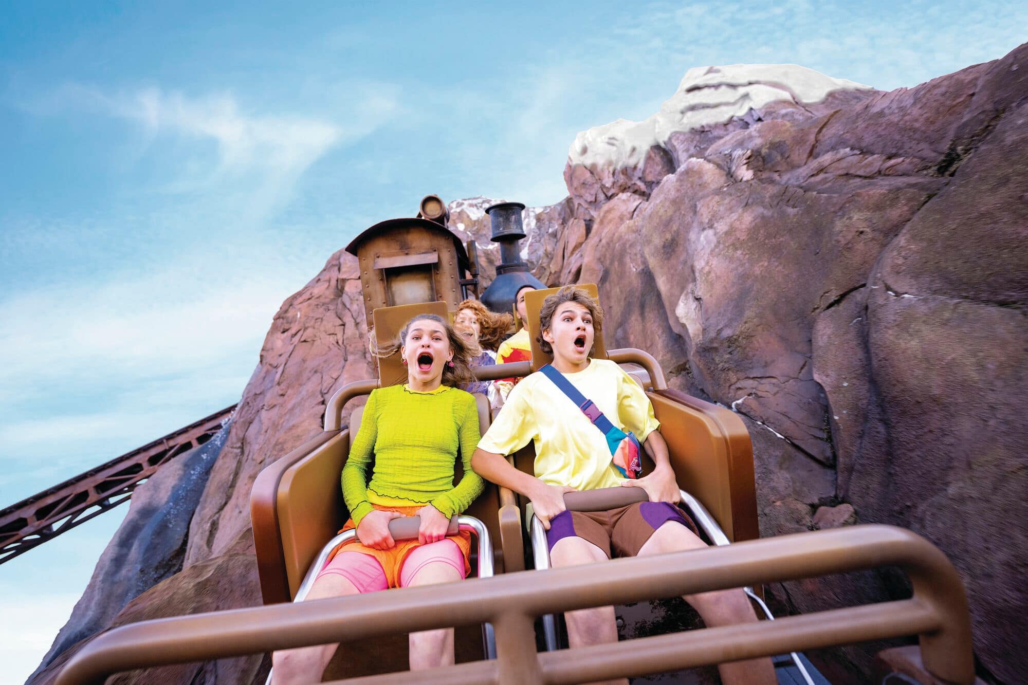 A family enjoy an Animal Kingdom rollercoaster ride.