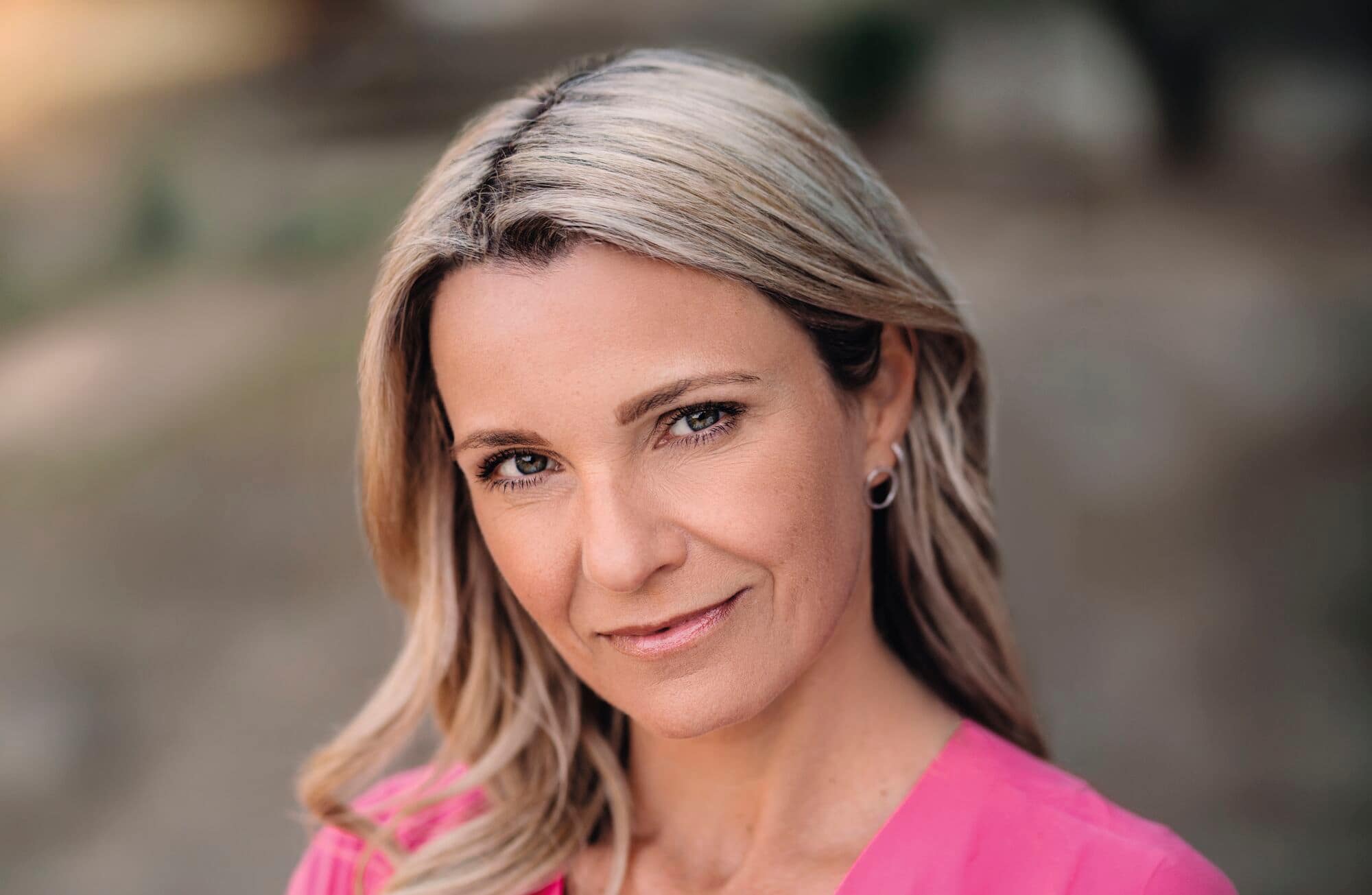 A headshot of Jenna Lee James.