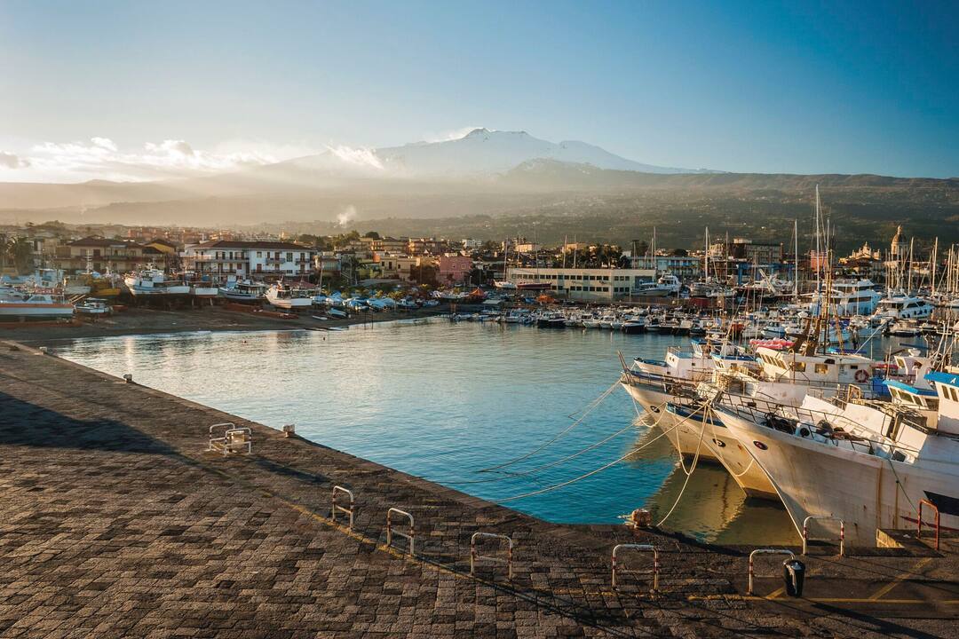 A view of Mt Etna from the marina in Riposto