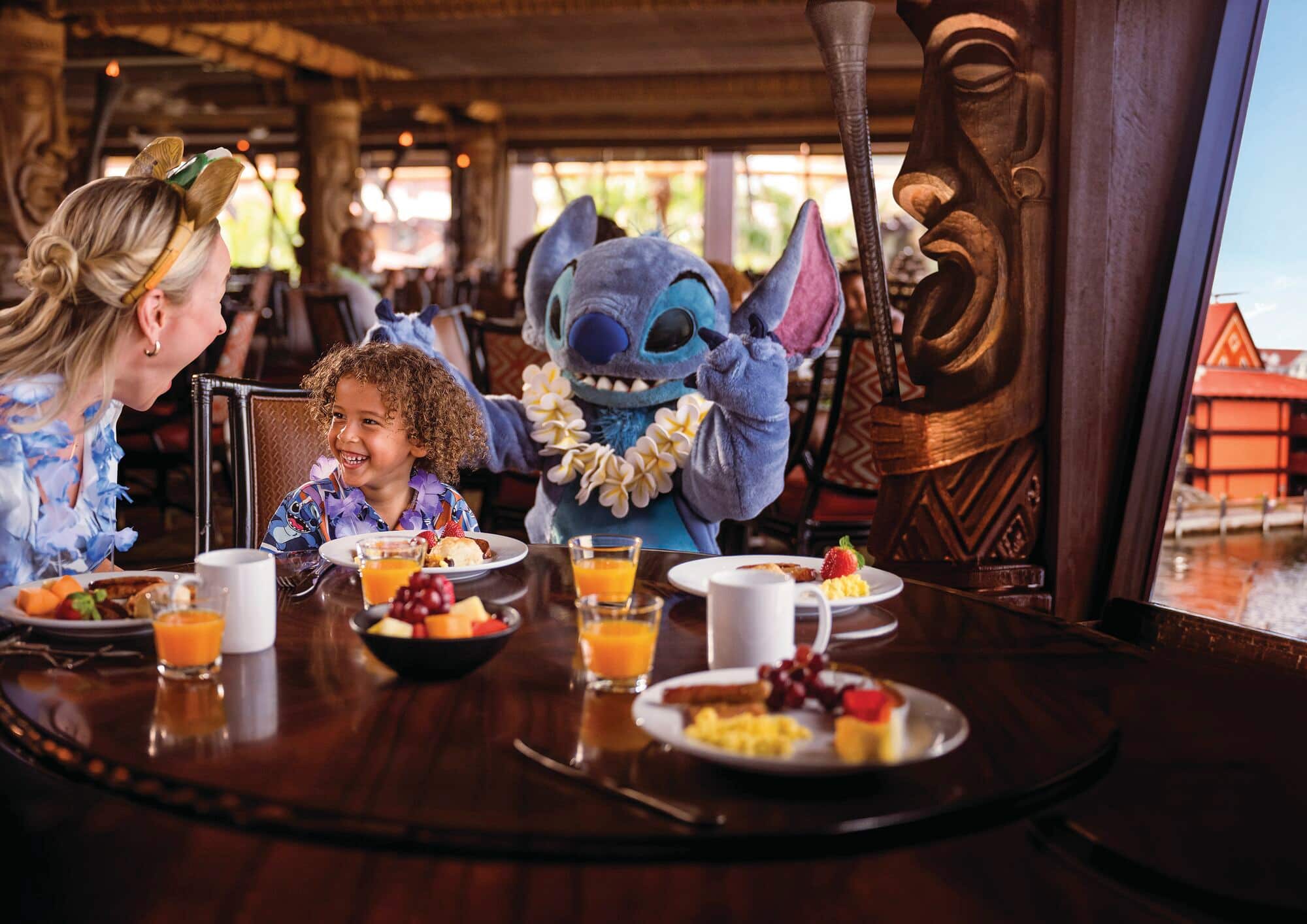 A family doing character dining with Stitch.