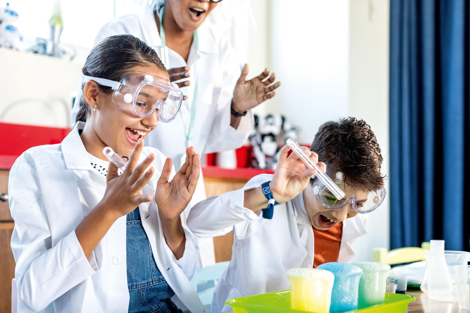 Kids having fun doing some science experiments.