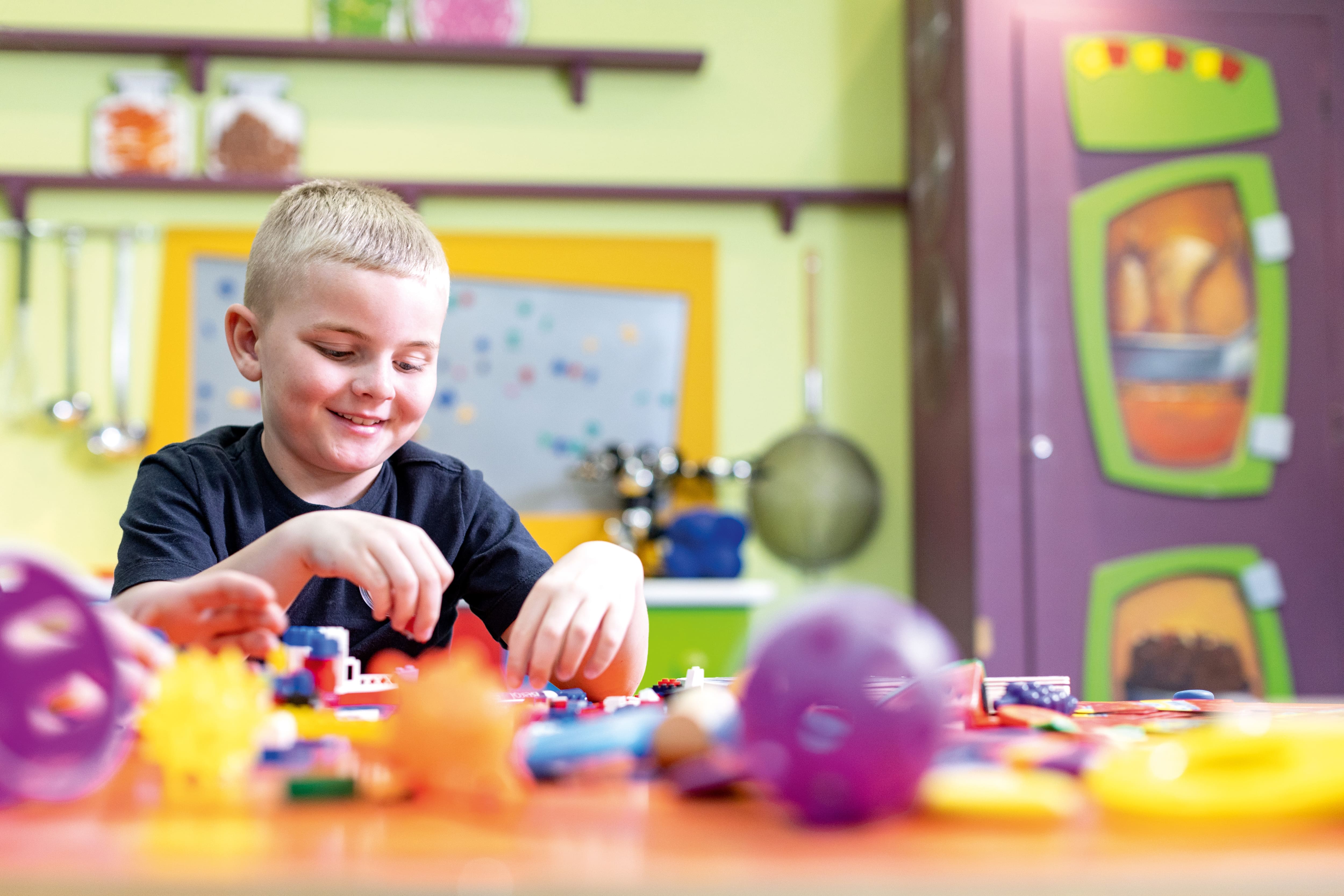 A child playing with building blocks.